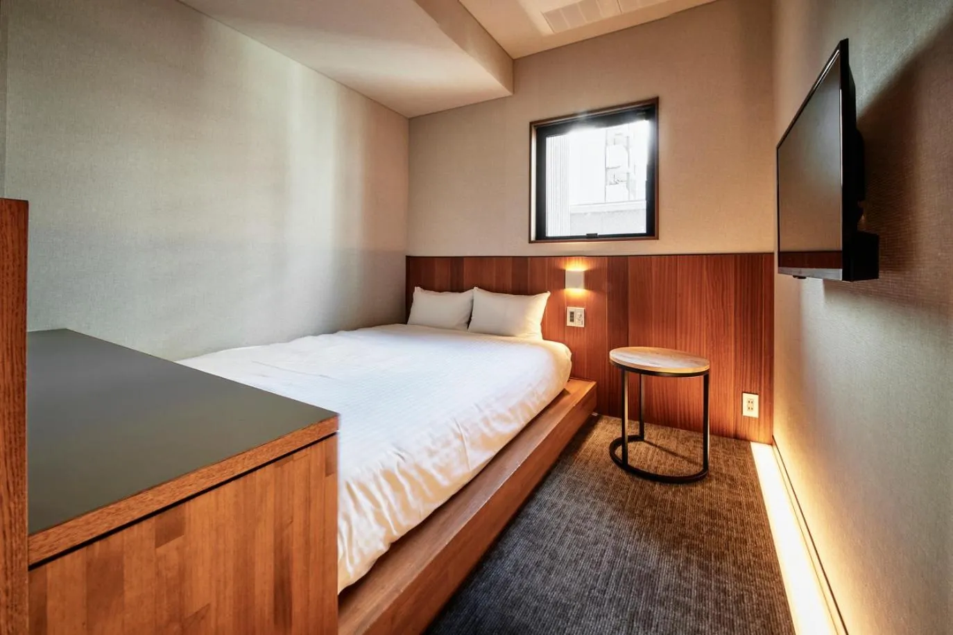 Bed in &HOTEL HAKATA