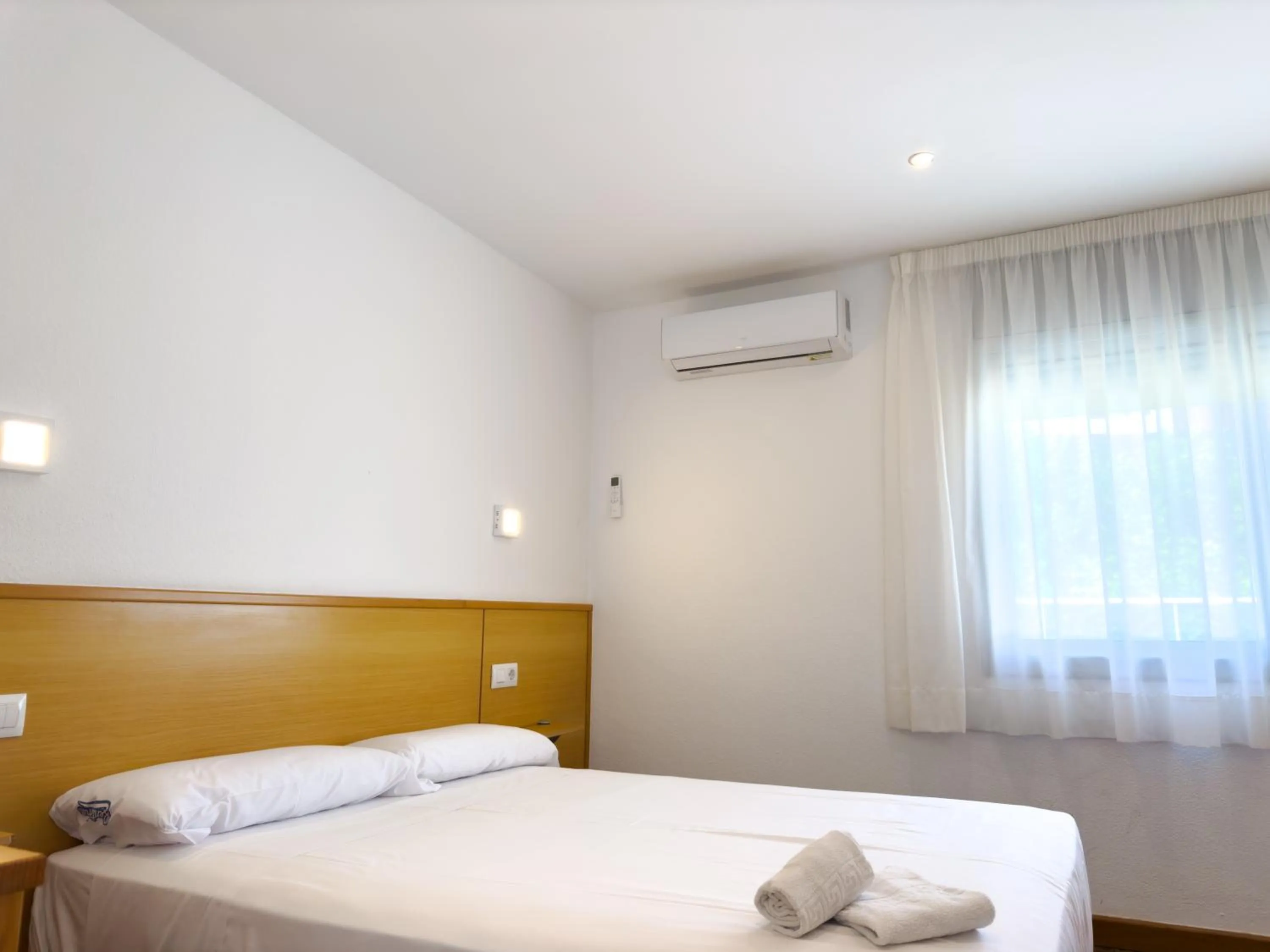 Bed in Rentalmar Atlantida Atico