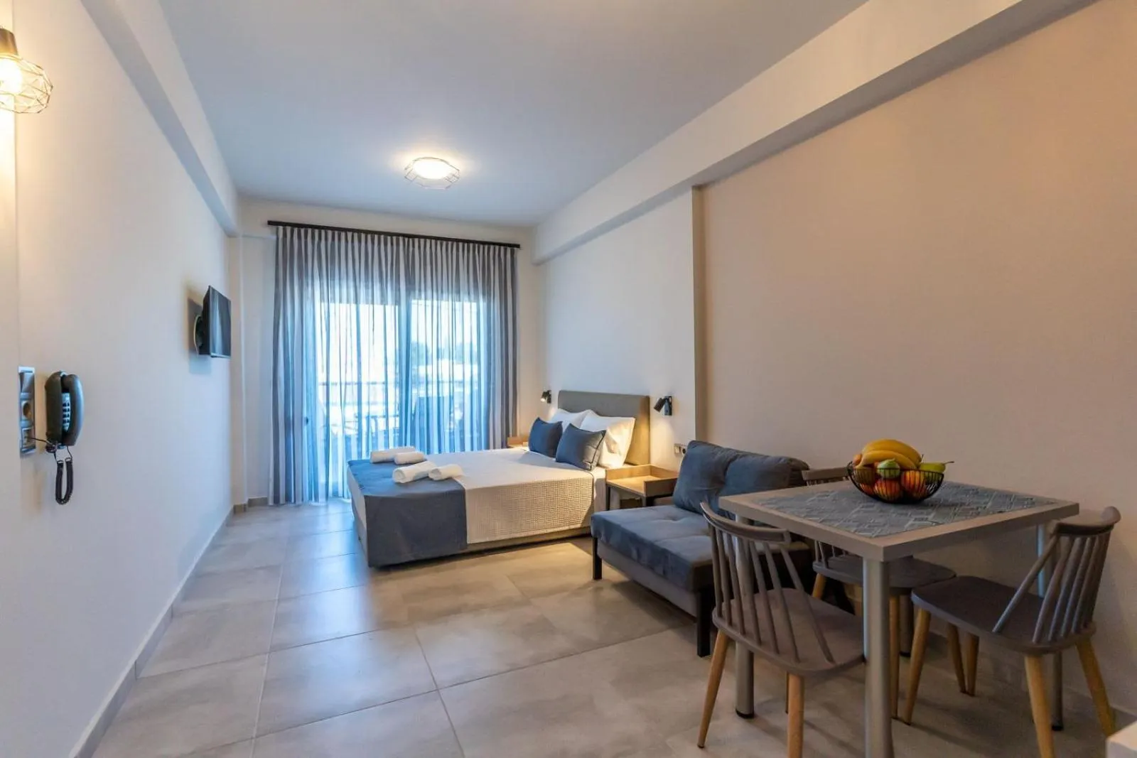 Seating area, Bed in AURA APARTMENTS