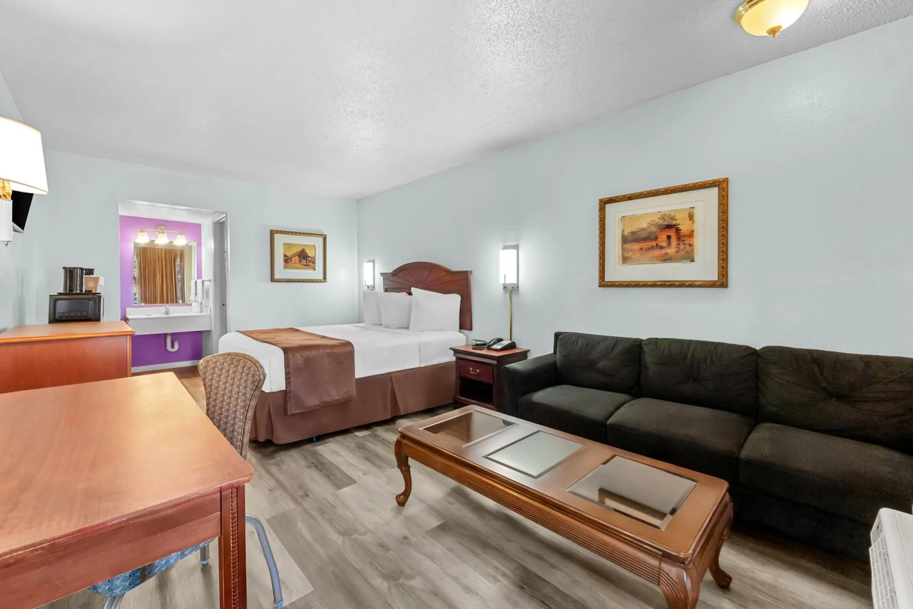 Seating area in Knights Inn San Antonio near Frost Bank Center