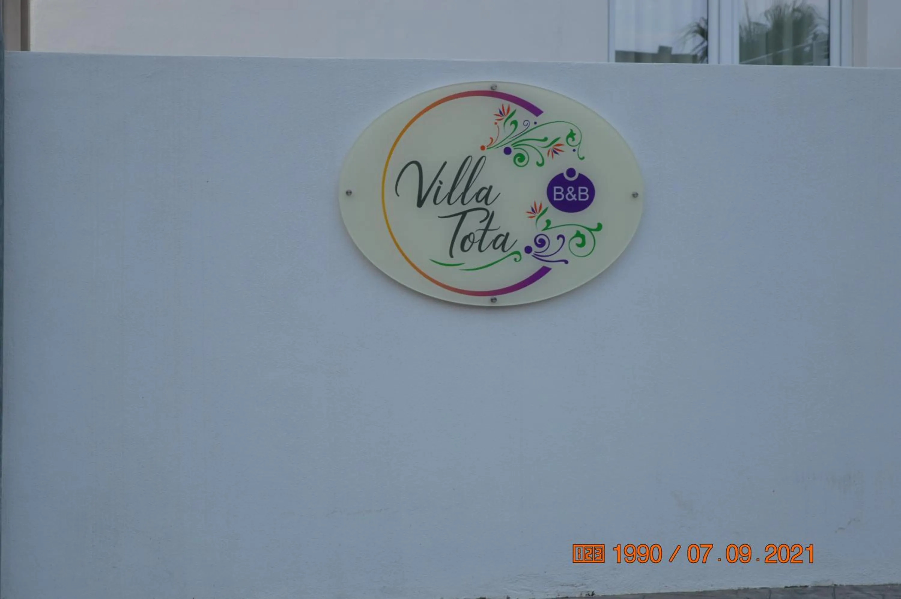 Property logo or sign in Bed and breakfast Villa Tota