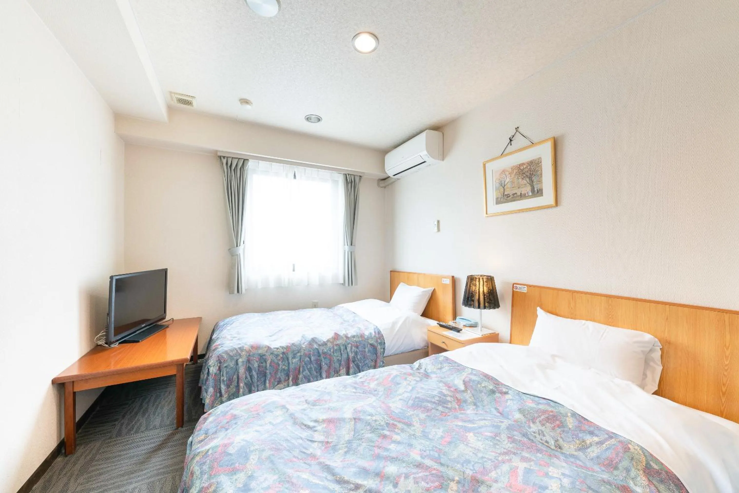 Bed in Tabist Hotel Diana Yachiyodai