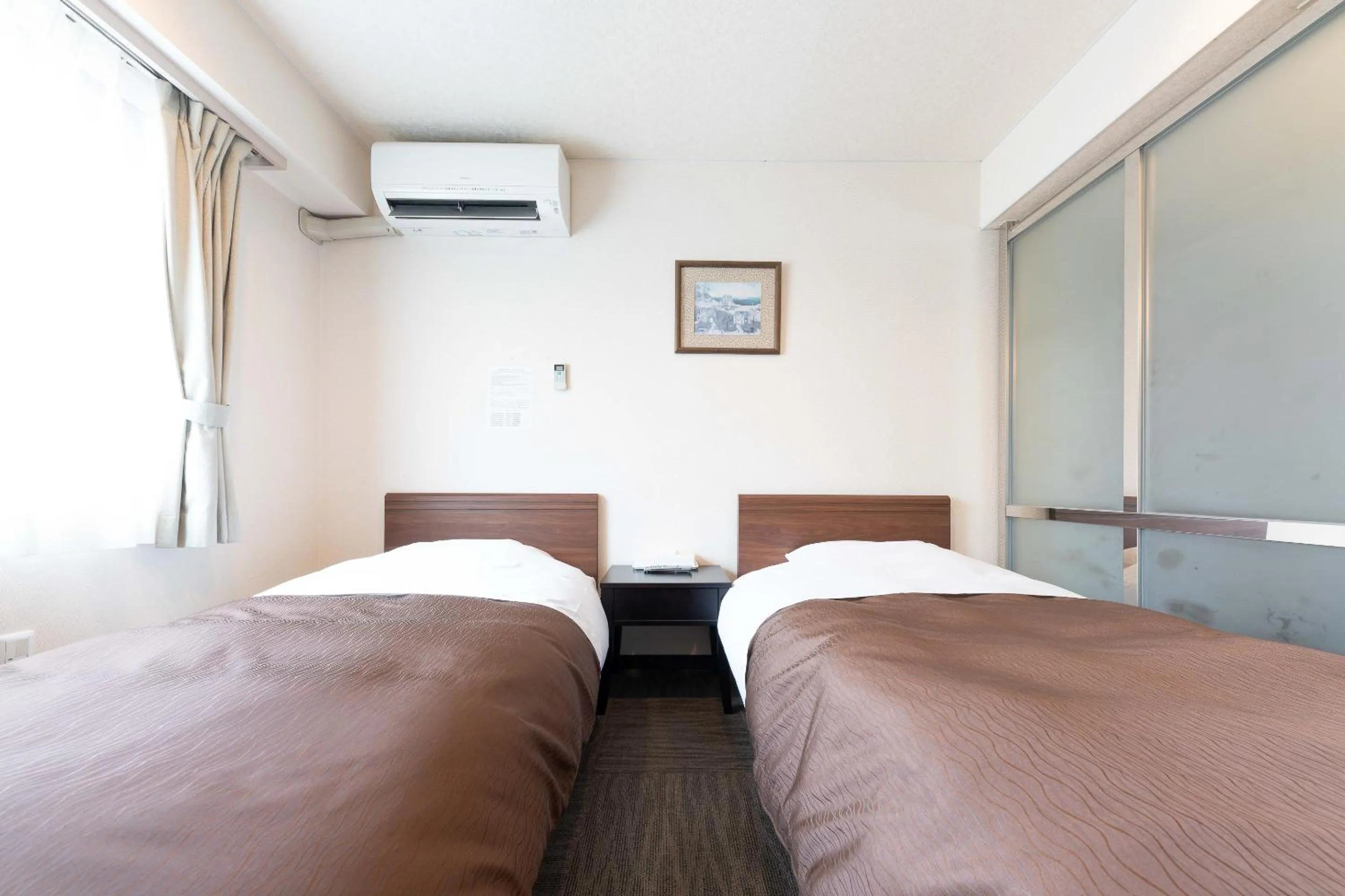 Bed in Tabist Hotel Diana Yachiyodai
