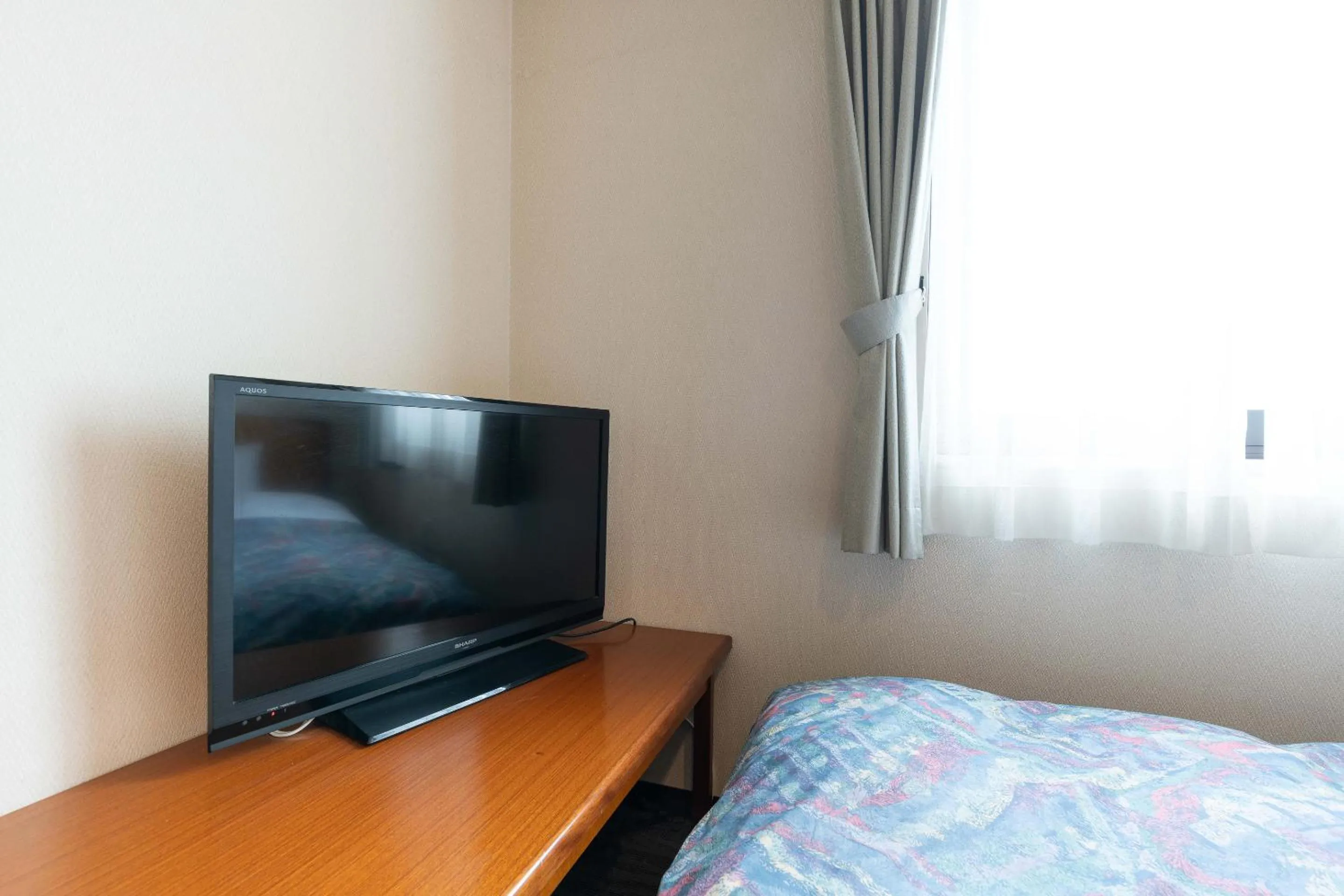 Bed in Tabist Hotel Diana Yachiyodai