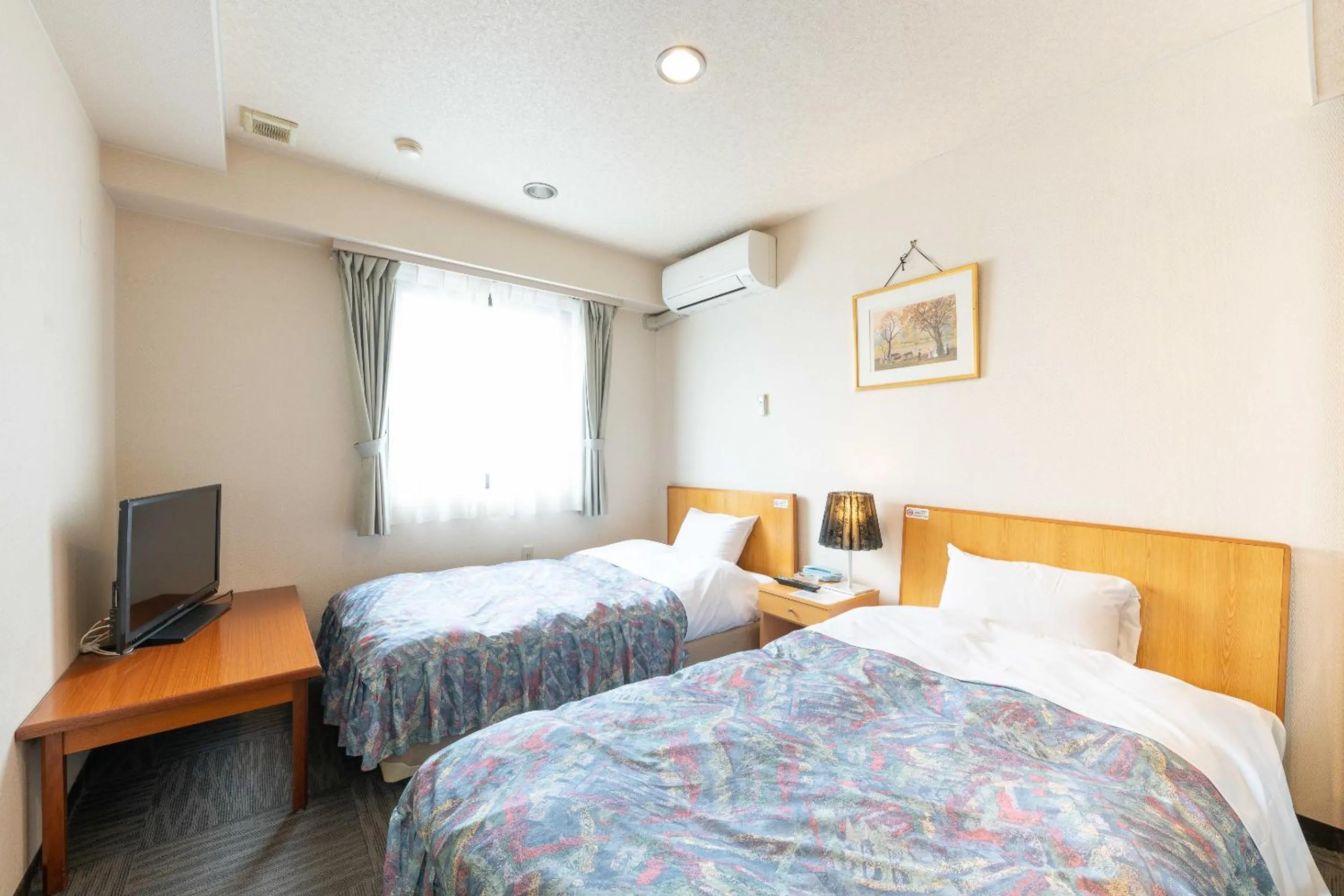 Bed in Tabist Hotel Diana Yachiyodai