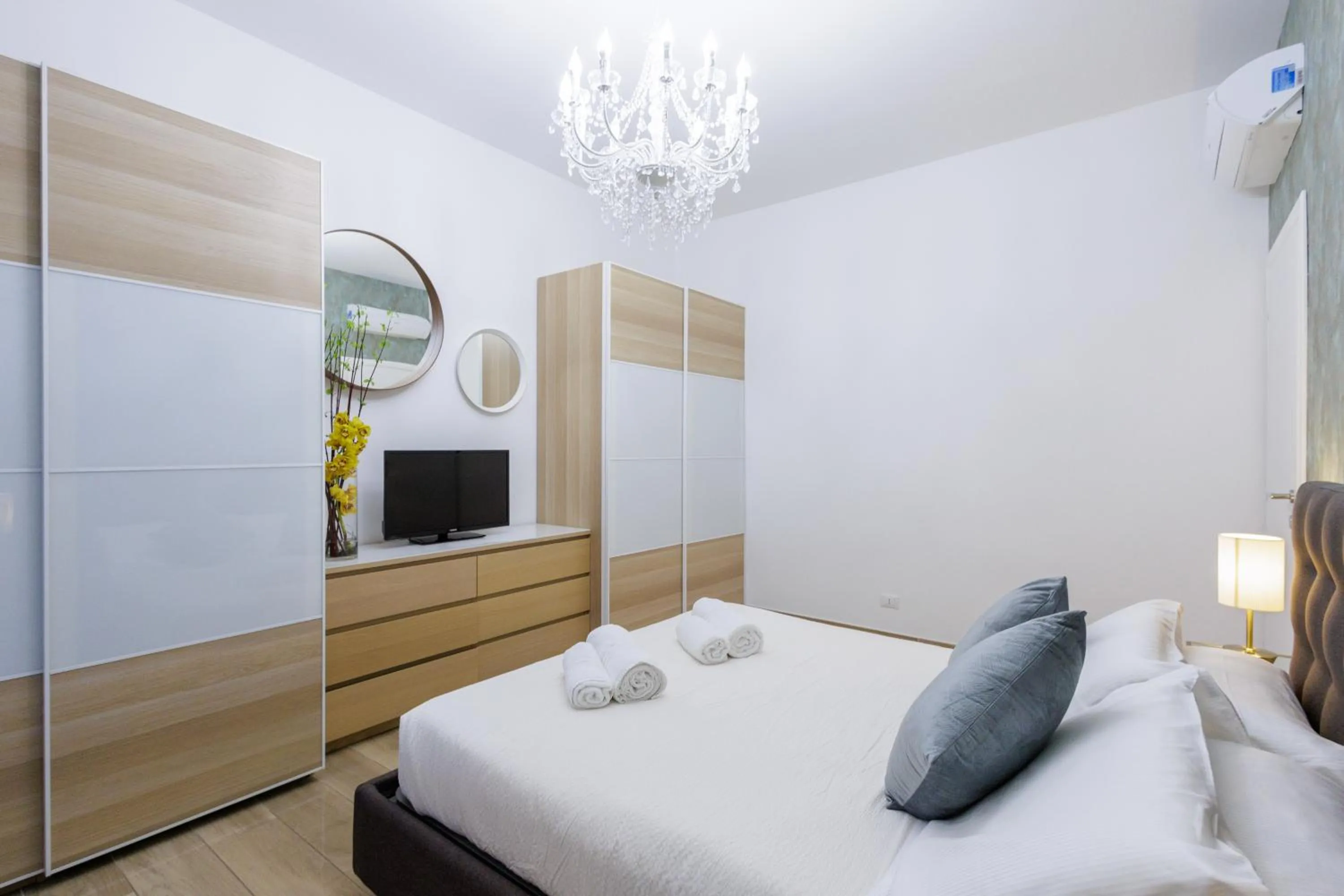 Bed in Genoa Lux Apartments with parking