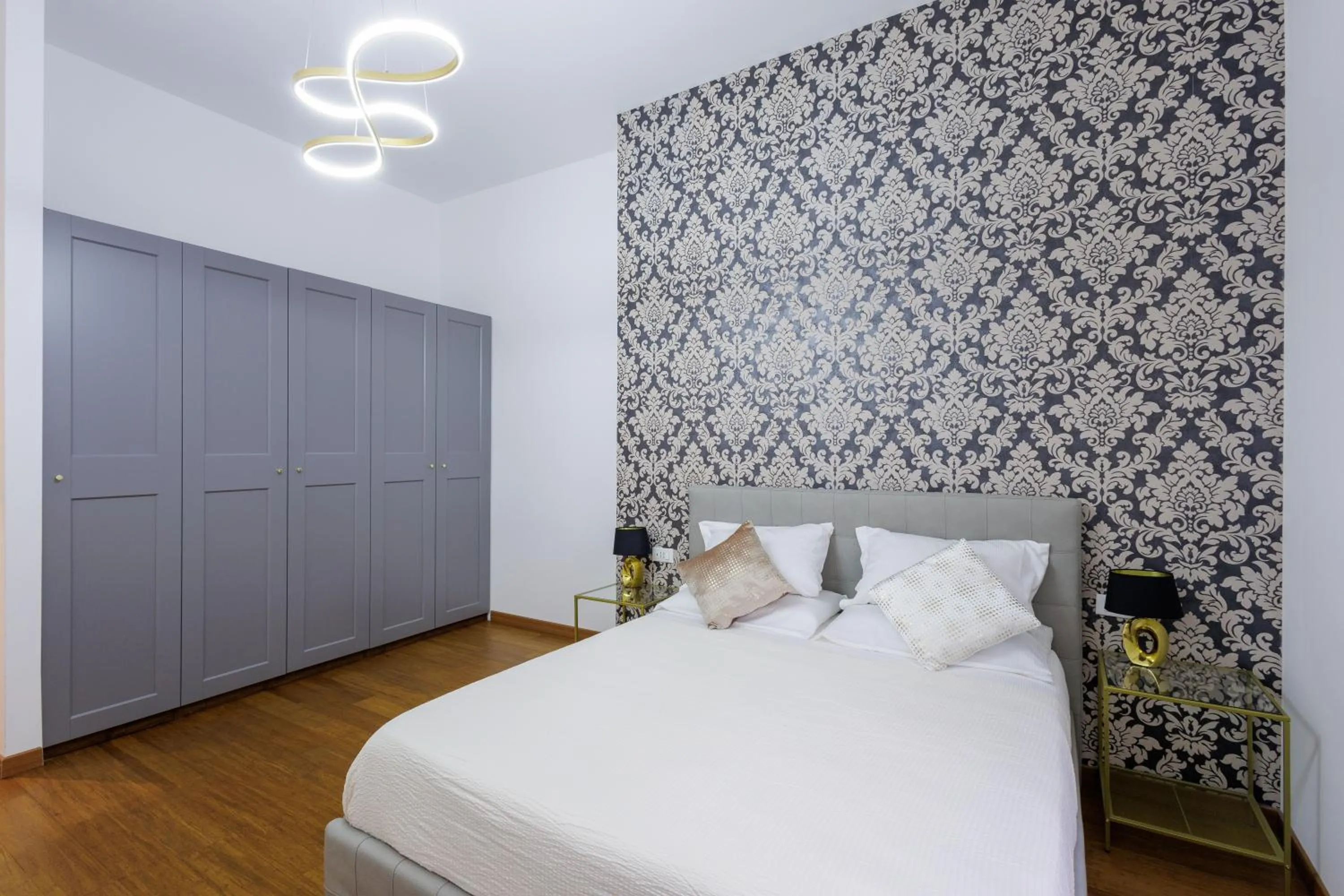 Bed in Genoa Lux Apartments with parking