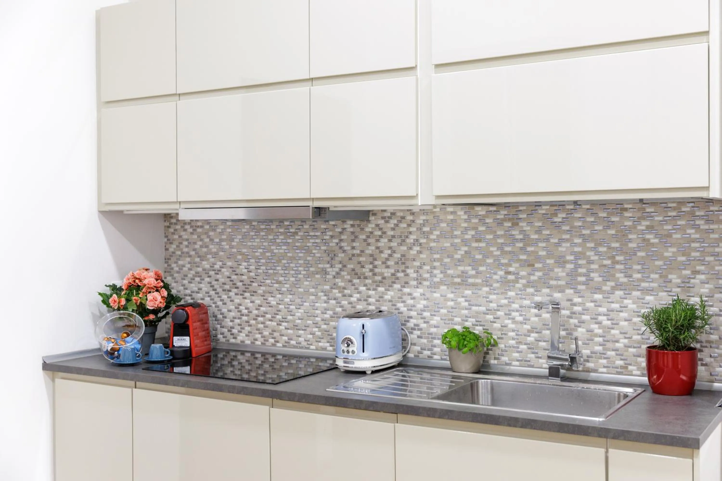 Coffee/tea facilities in Genoa Lux Apartments with parking