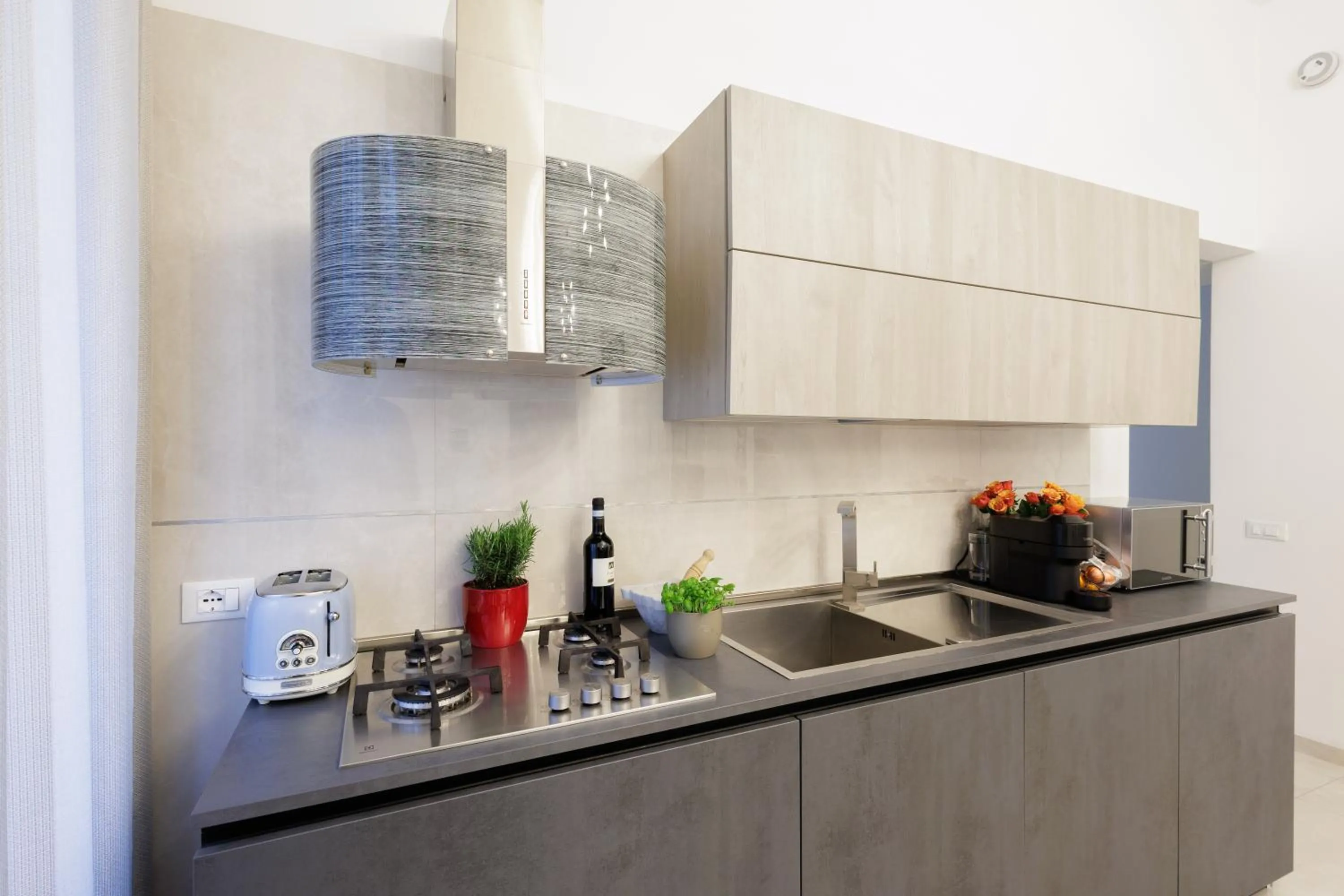 Coffee/tea facilities in Genoa Lux Apartments with parking