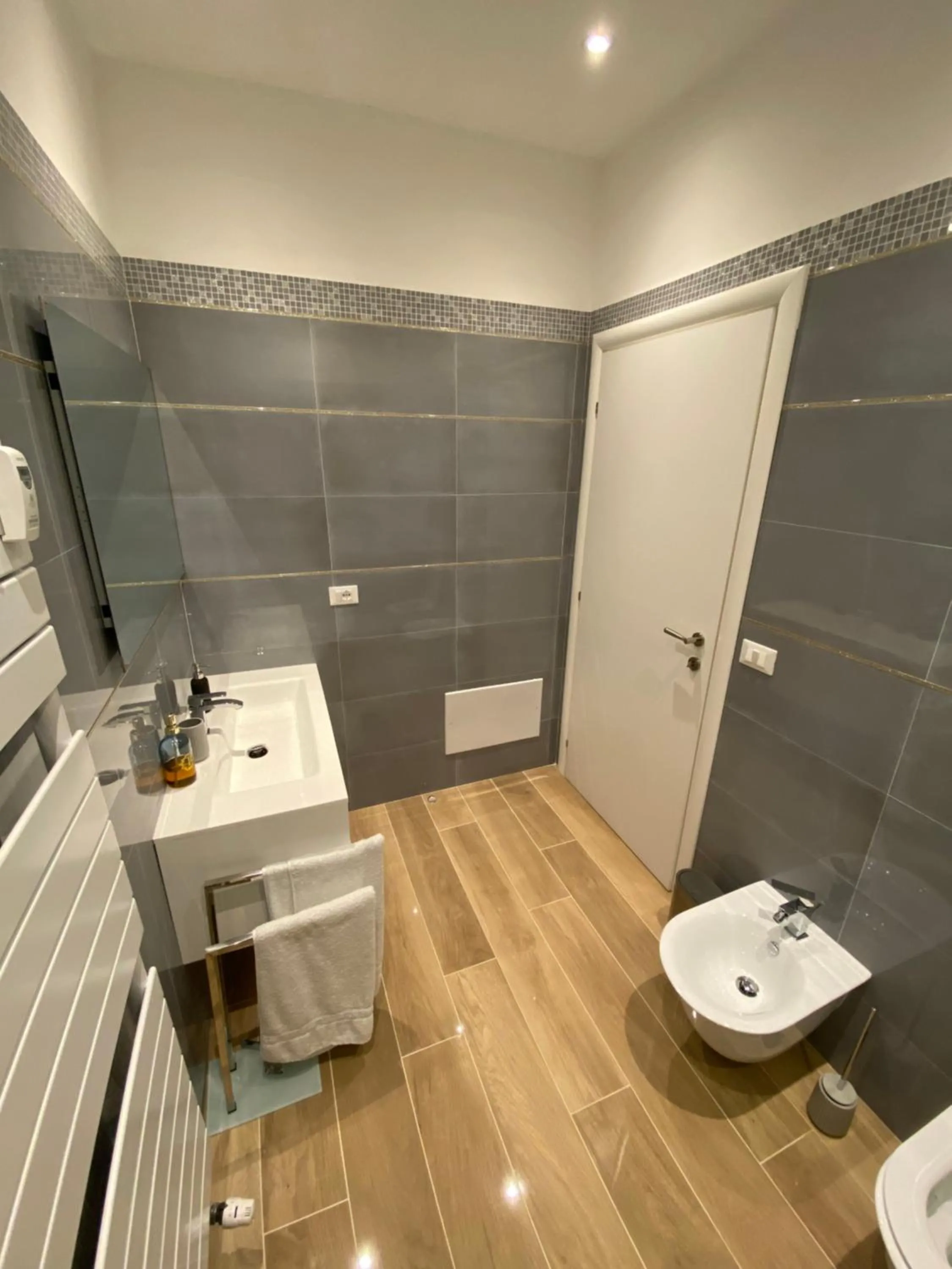 Bathroom in Genoa Lux Apartments with parking