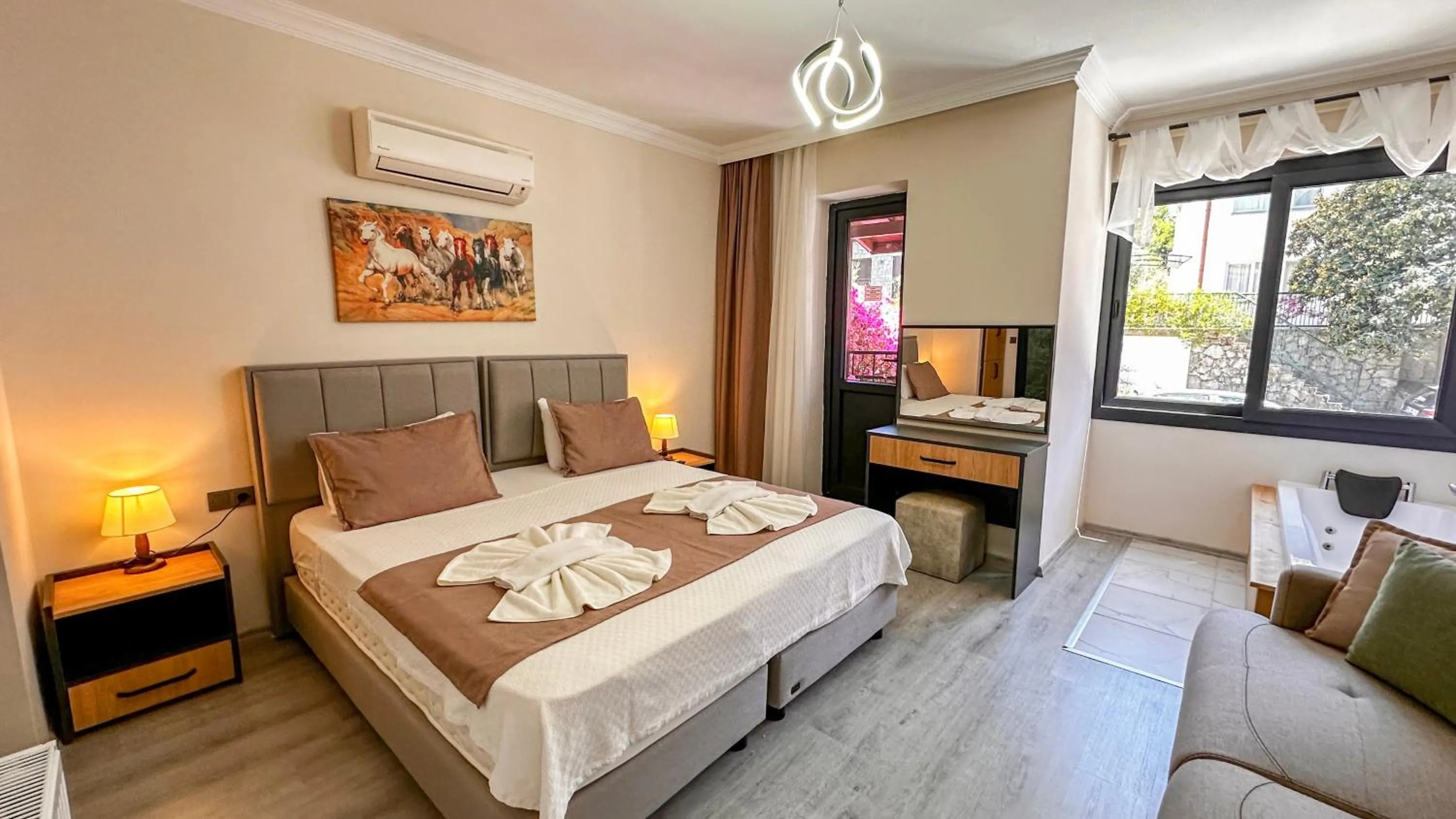 Bed in Mykonut Boutique Suites