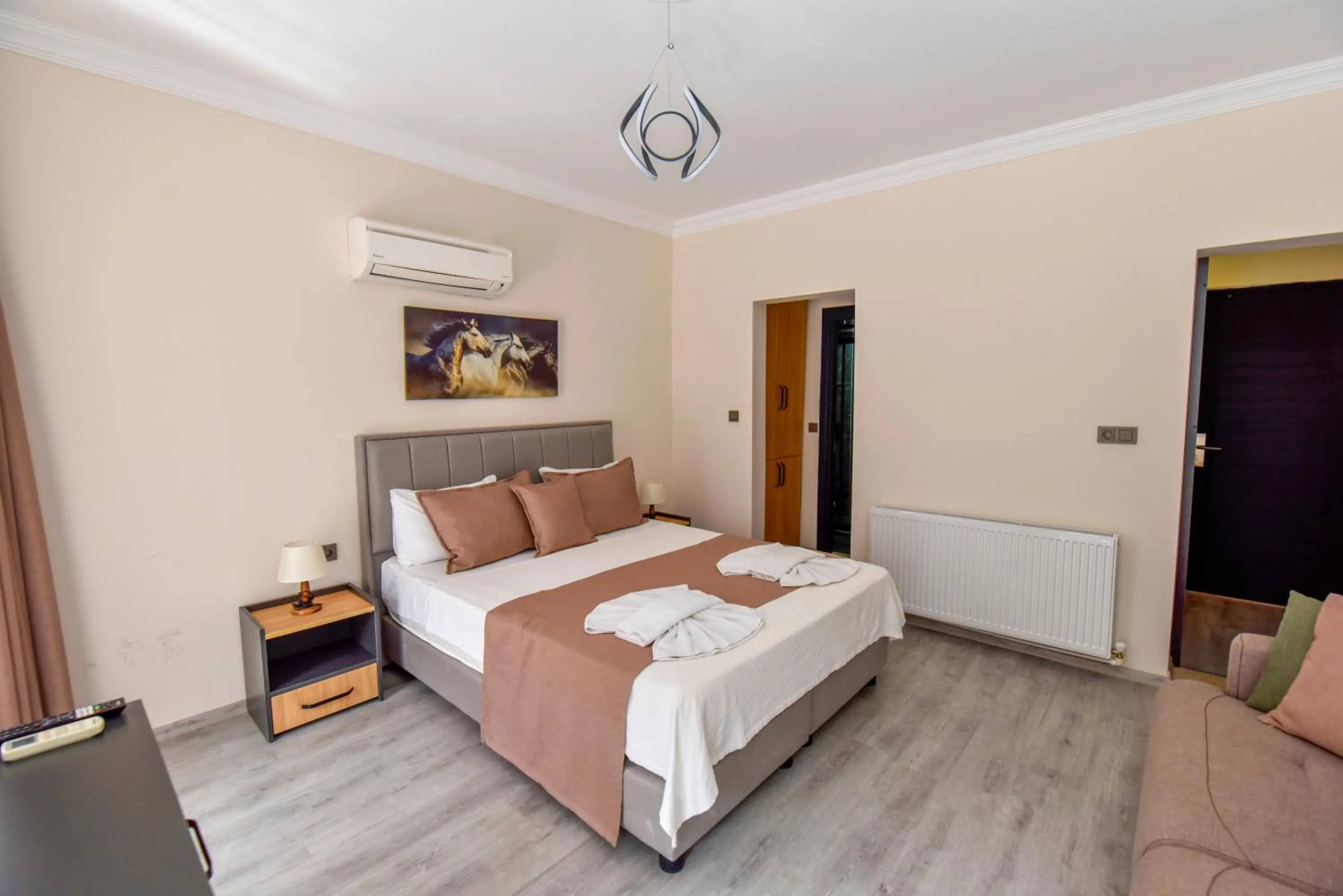 Bed in Mykonut Boutique Suites