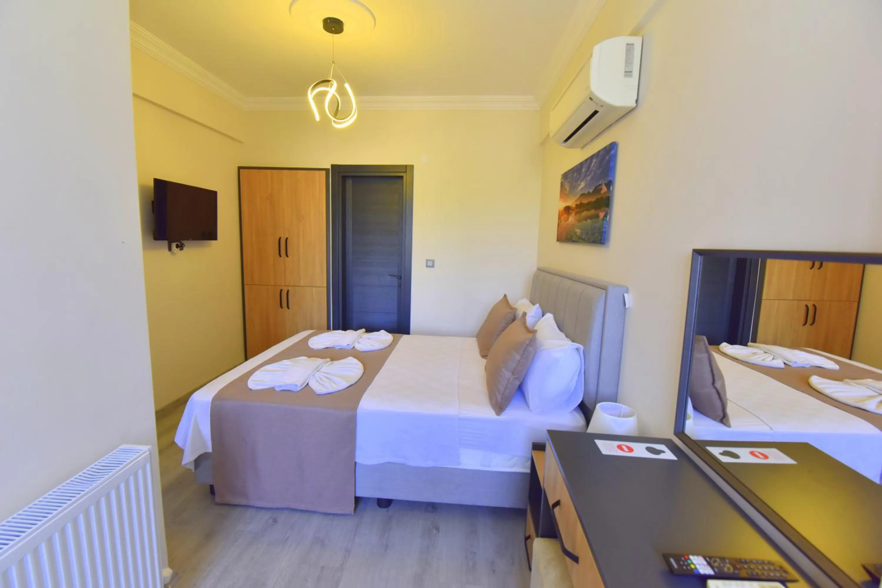 Bed in Mykonut Boutique Suites