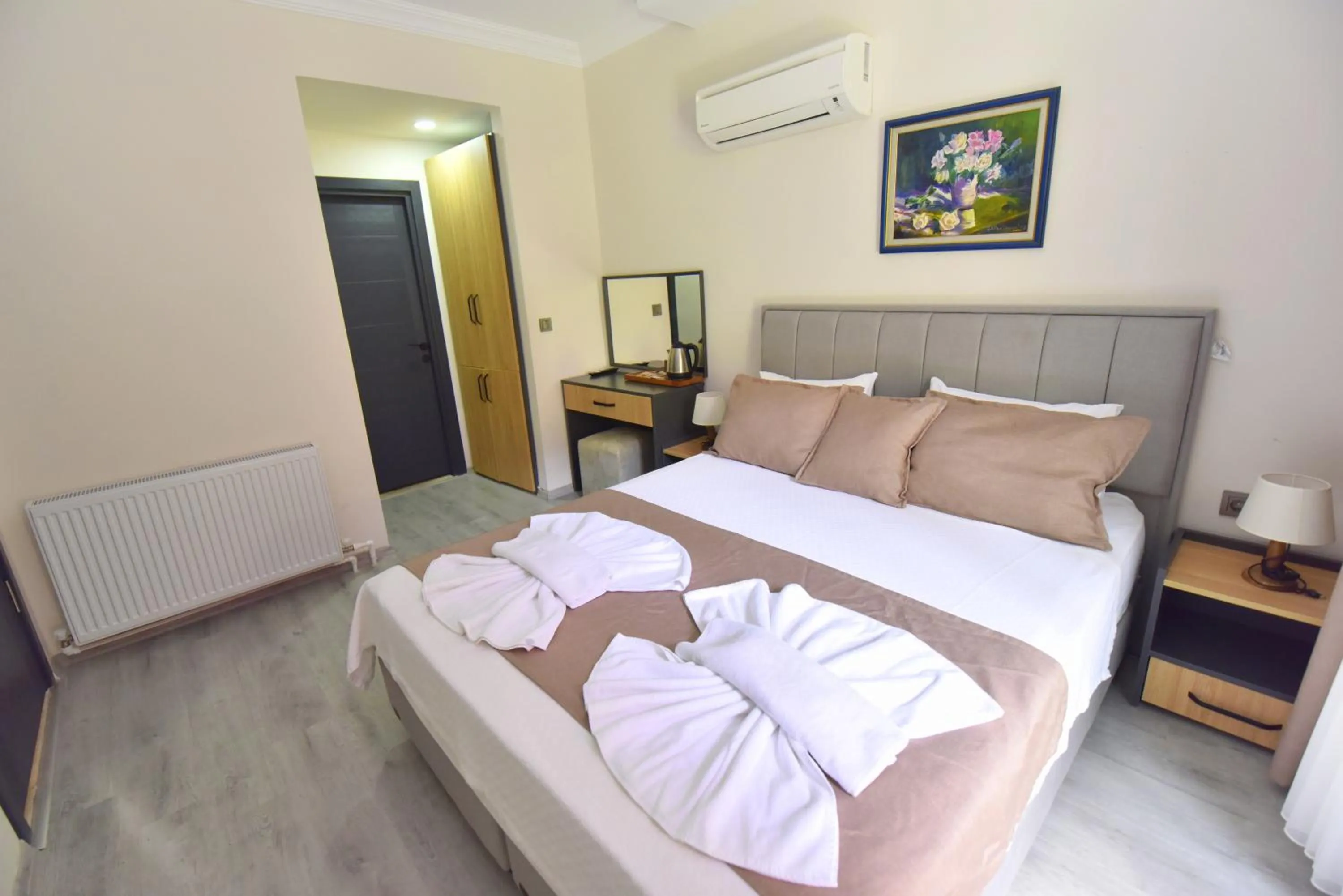 Bed in Mykonut Boutique Suites