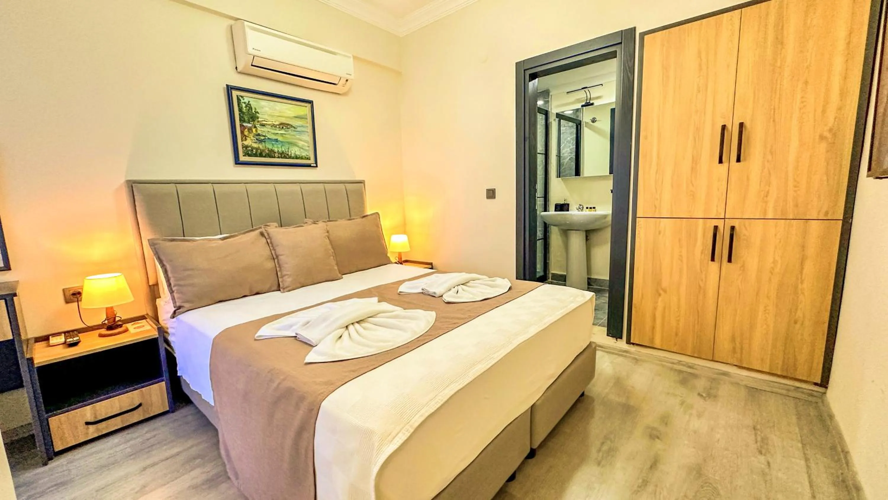 Bed in Mykonut Boutique Suites