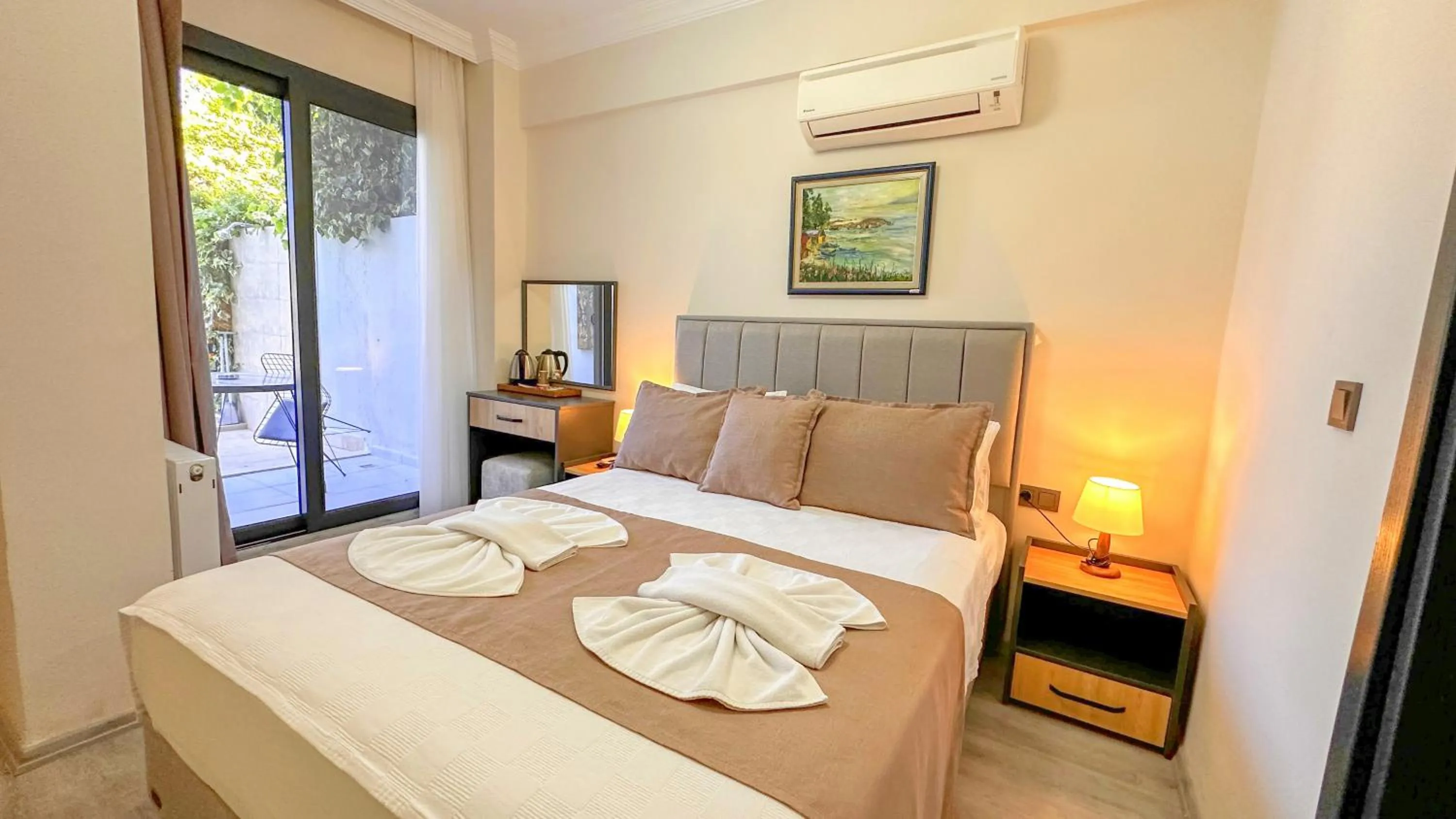 Bed in Mykonut Boutique Suites