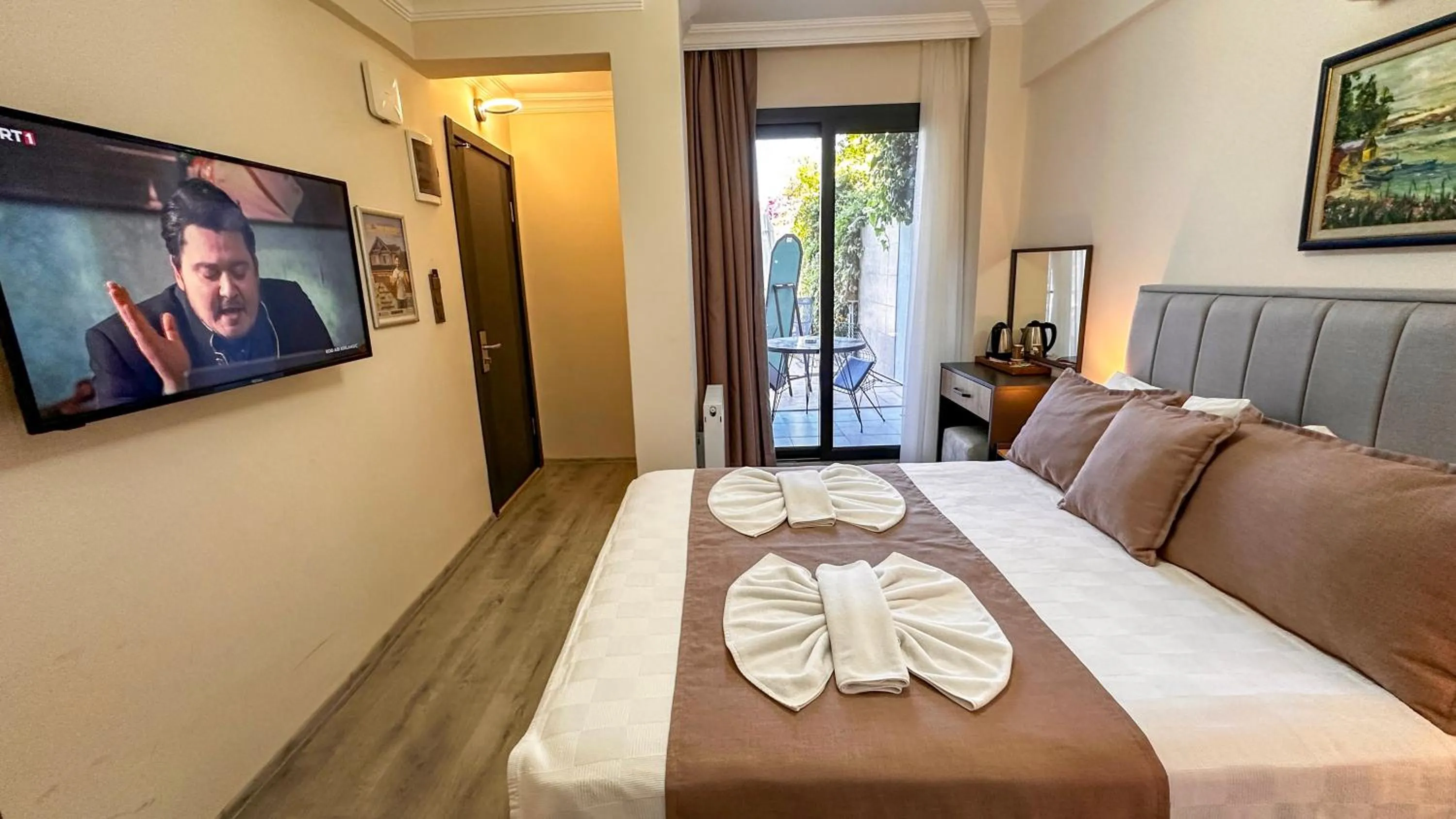 Bed in Mykonut Boutique Suites