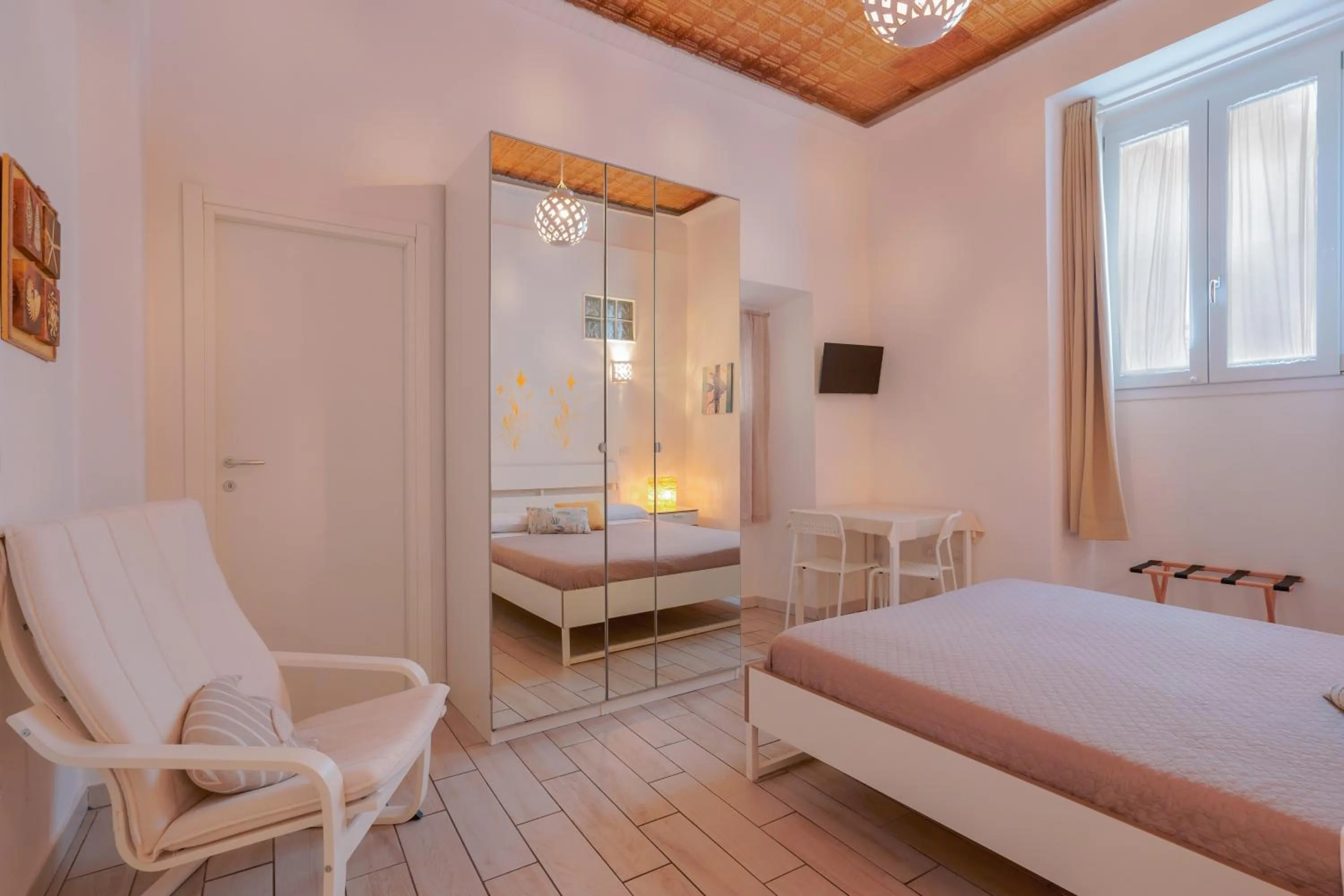 Bed in Approdo Rooms - Eja Sardinia