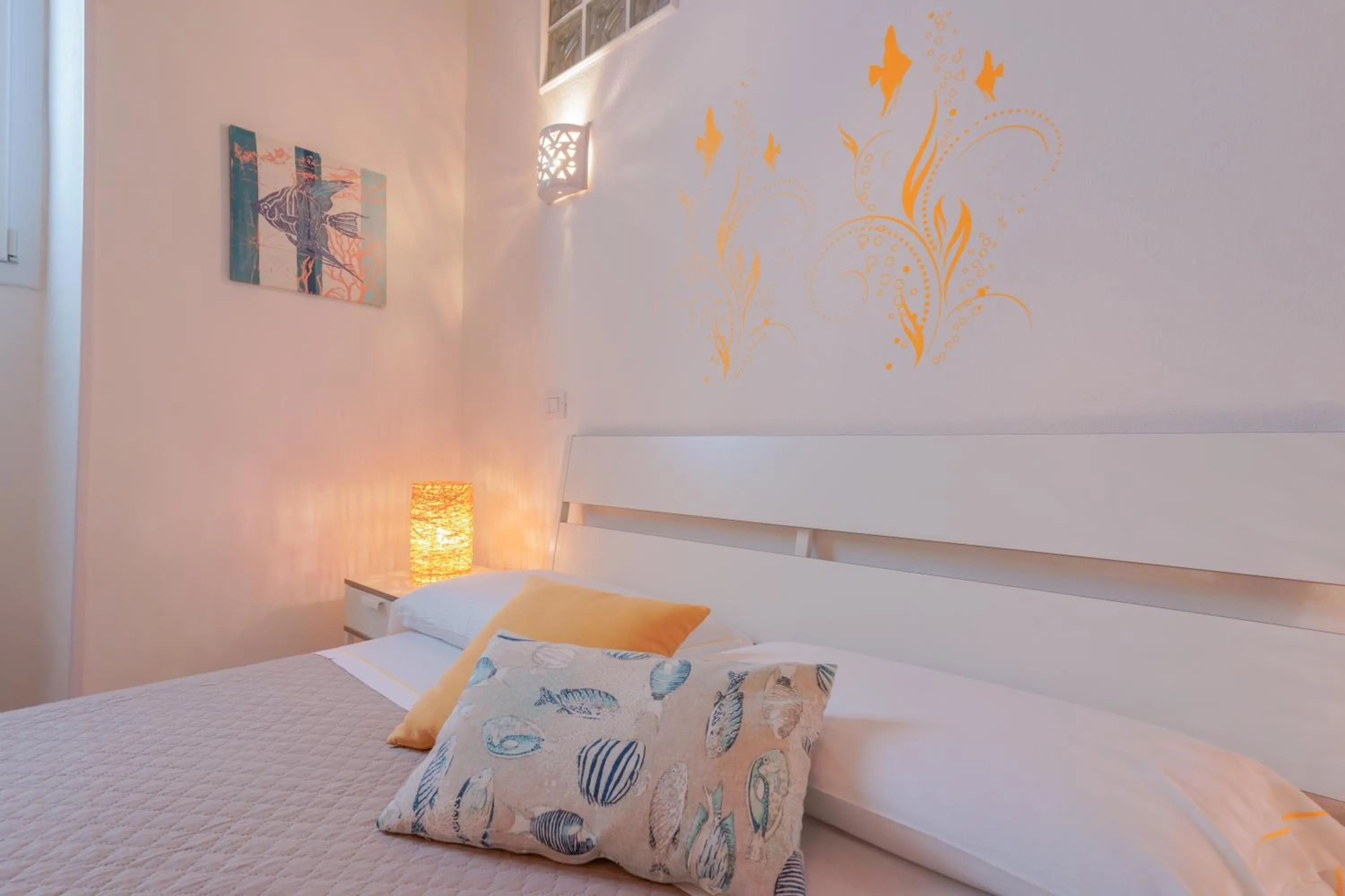 Bed in Approdo Rooms - Eja Sardinia