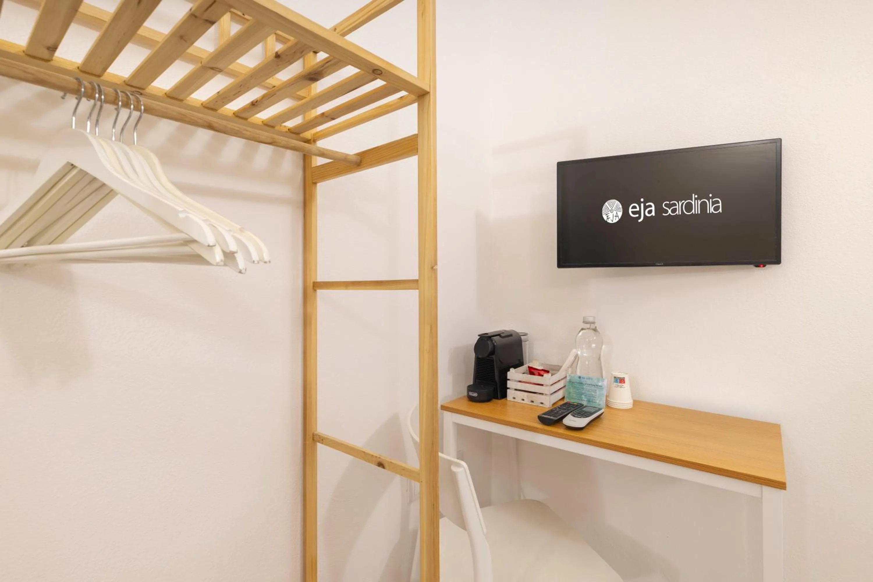 Property logo or sign in Approdo Rooms - Eja Sardinia