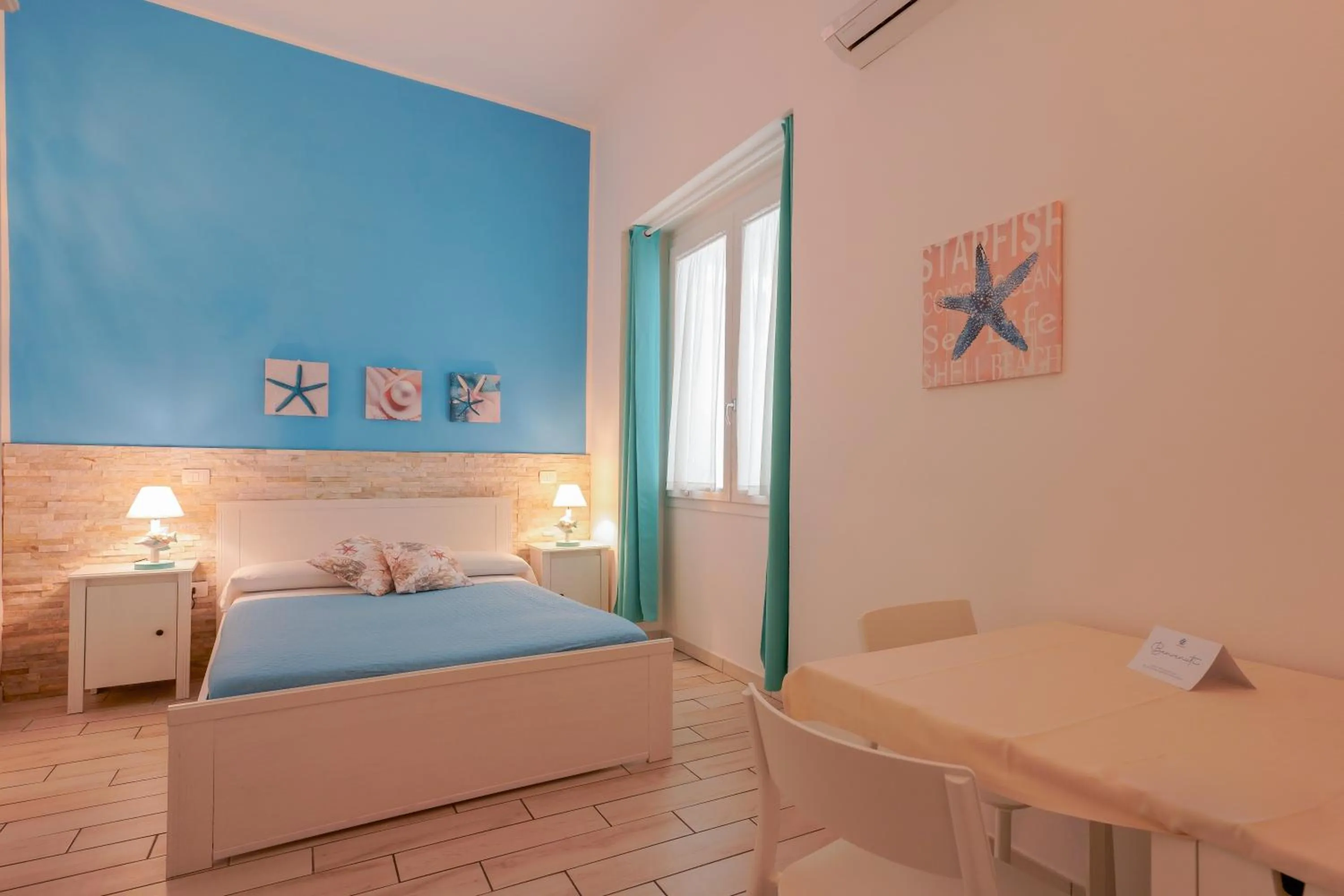 Bed in Approdo Rooms - Eja Sardinia