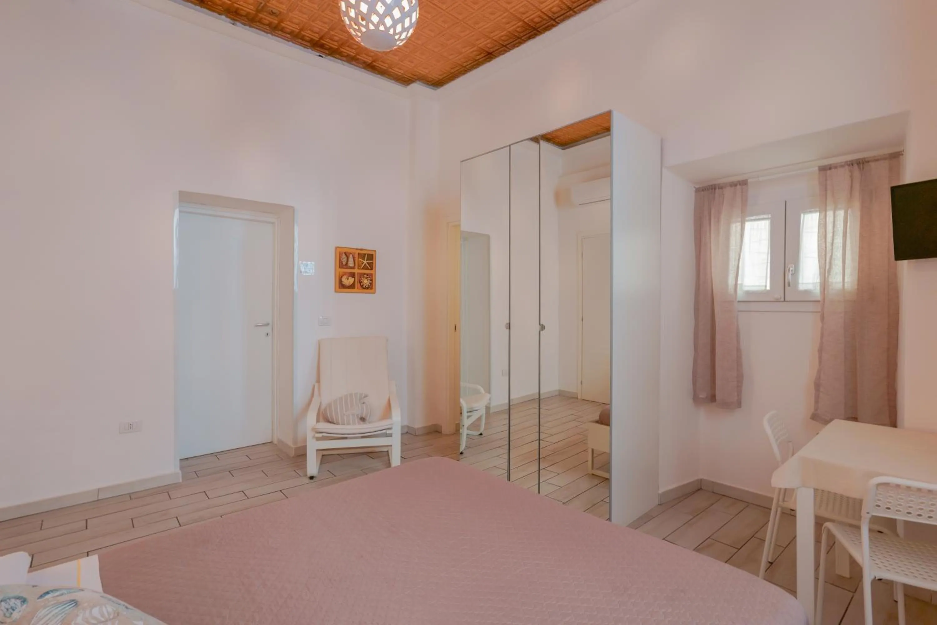 Bed in Approdo Rooms - Eja Sardinia