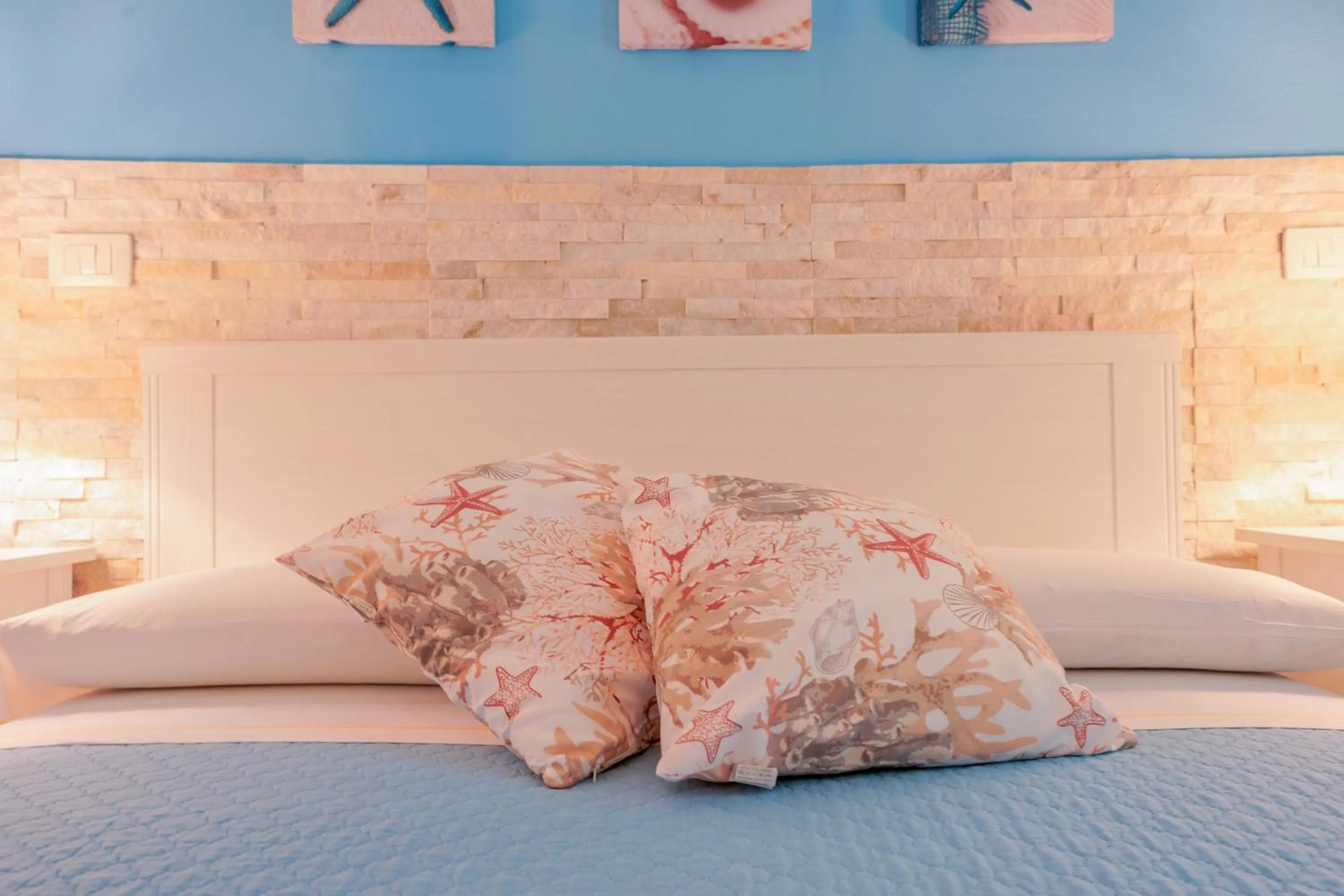 Bed in Approdo Rooms - Eja Sardinia