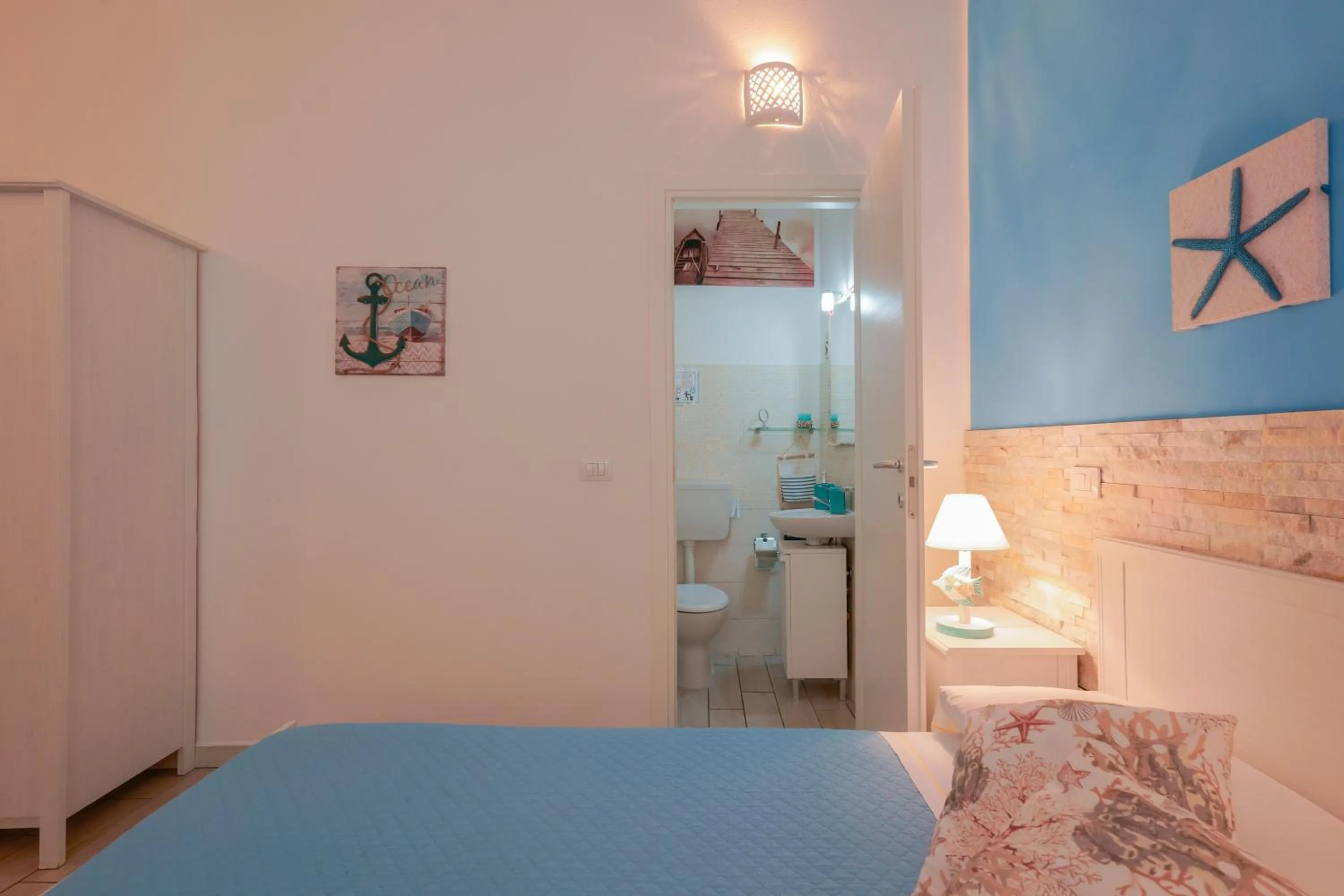 Shower, Bed in Approdo Rooms - Eja Sardinia