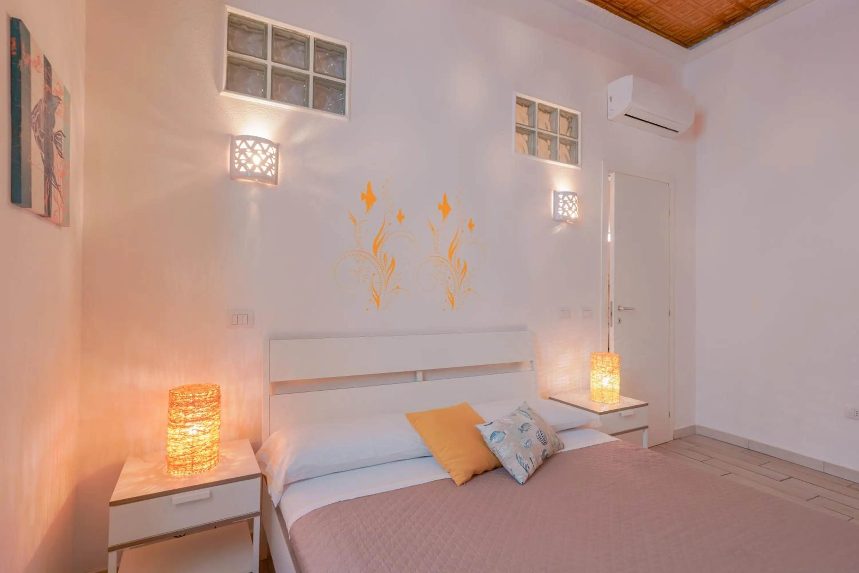 Bed in Approdo Rooms - Eja Sardinia