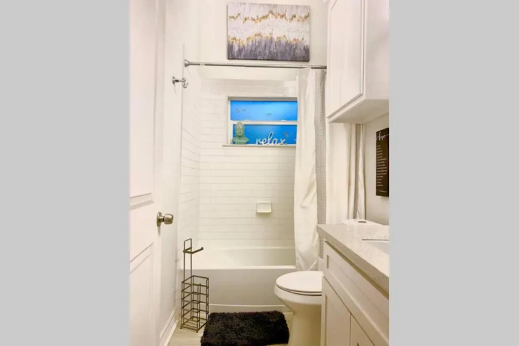 Bathroom in Updated Home, King bed suite Gated Free Parking