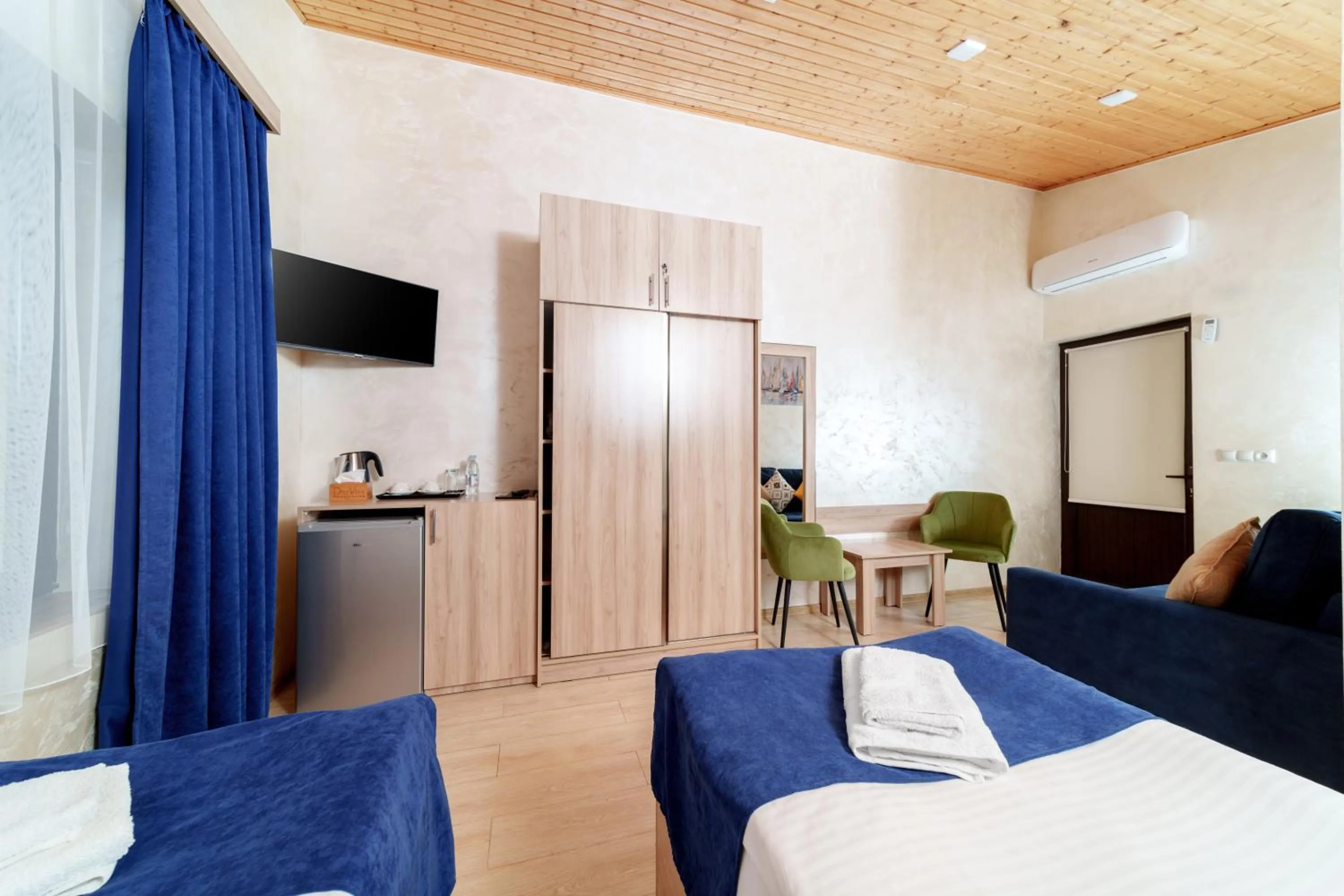 Bed in DiliVita Rest House