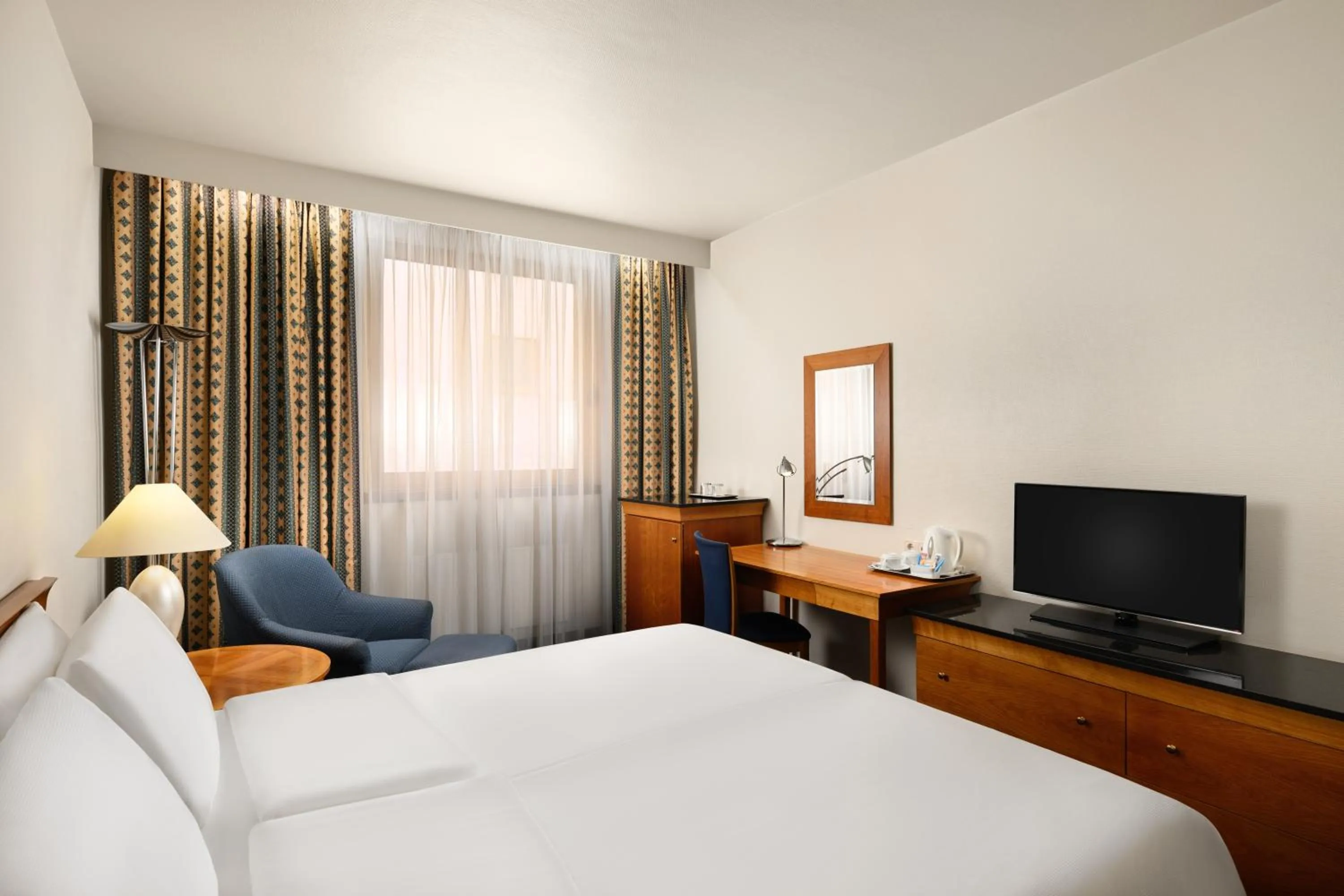 Photo of the whole room, Bed in Danubius Hotel Hungaria City Center