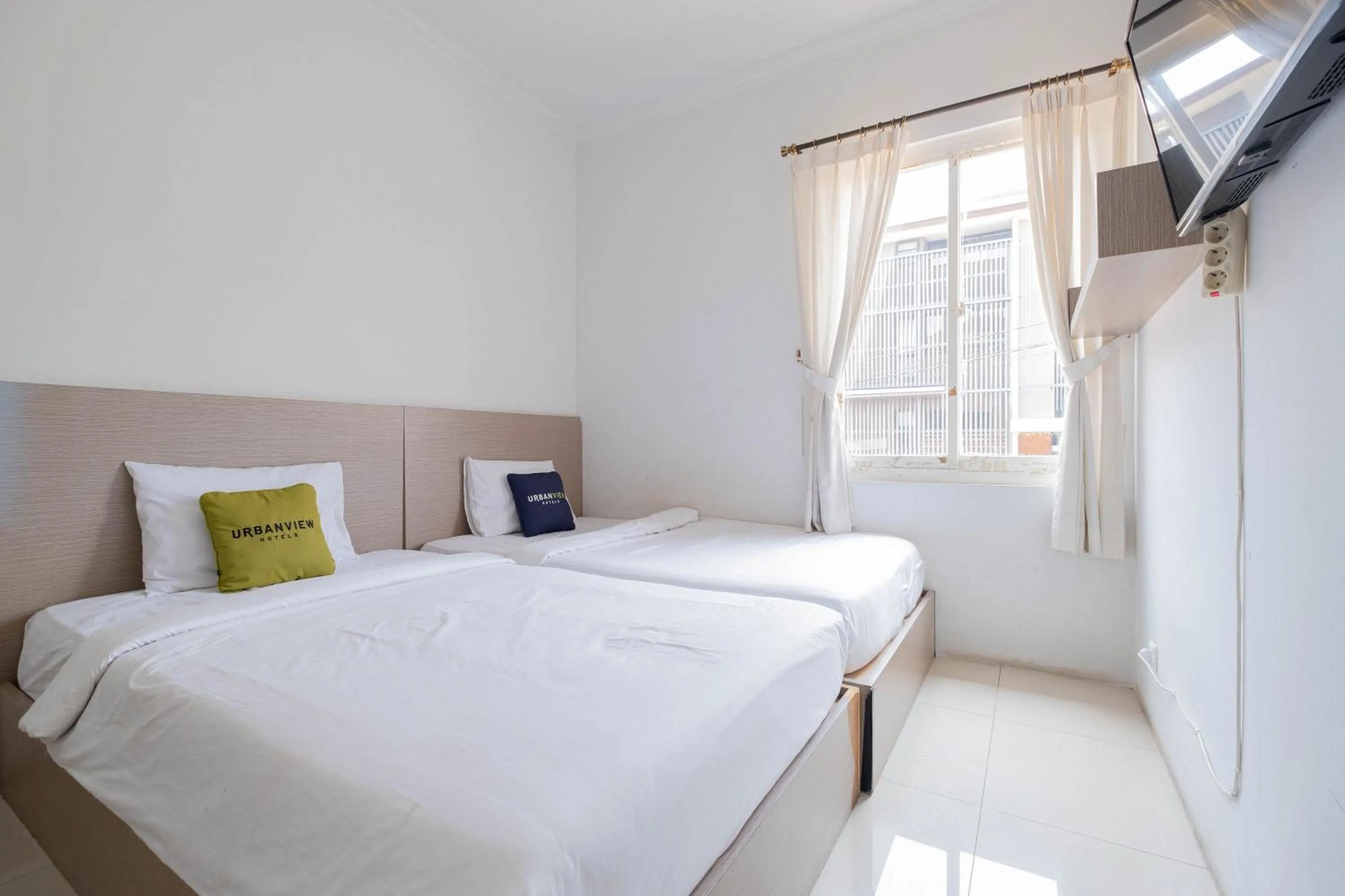 Bed in Urbanview Hotel Stariez Karawaci Tangerang by RedDoorz