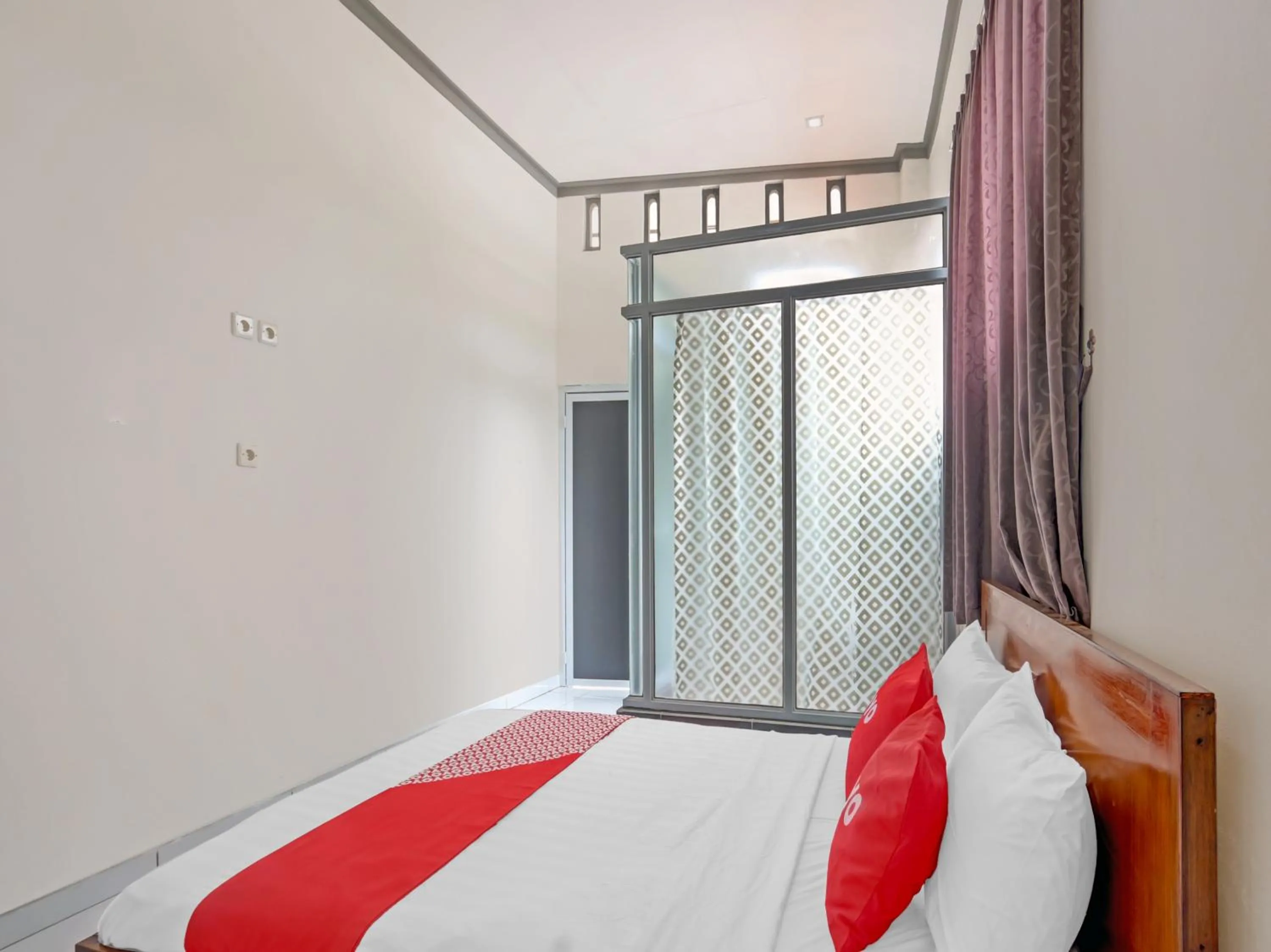 Bedroom in OYO 90517 Homestay Wonosobo Asri