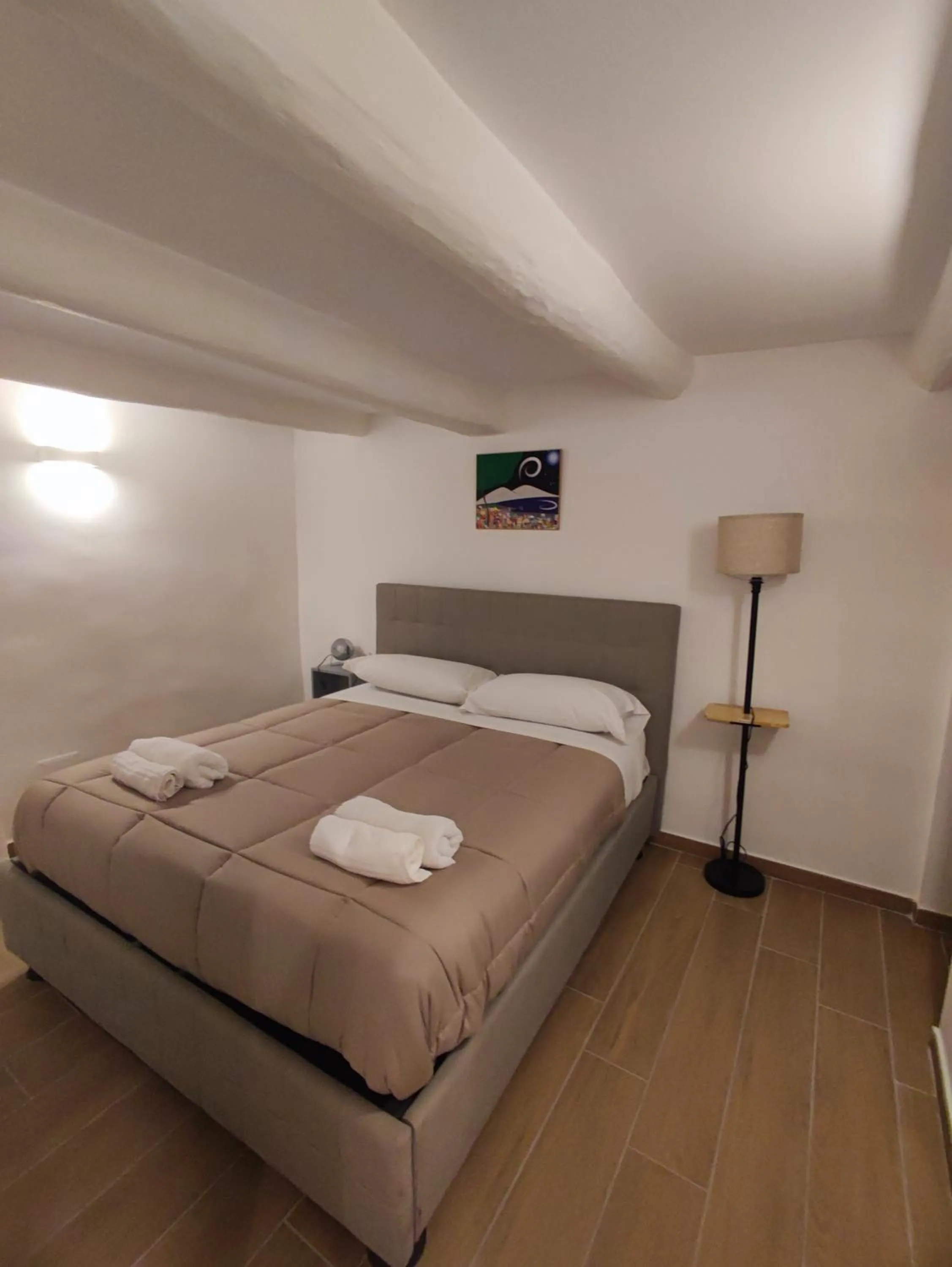 Bed in Duchessa Ravaschieri bed and breakfast