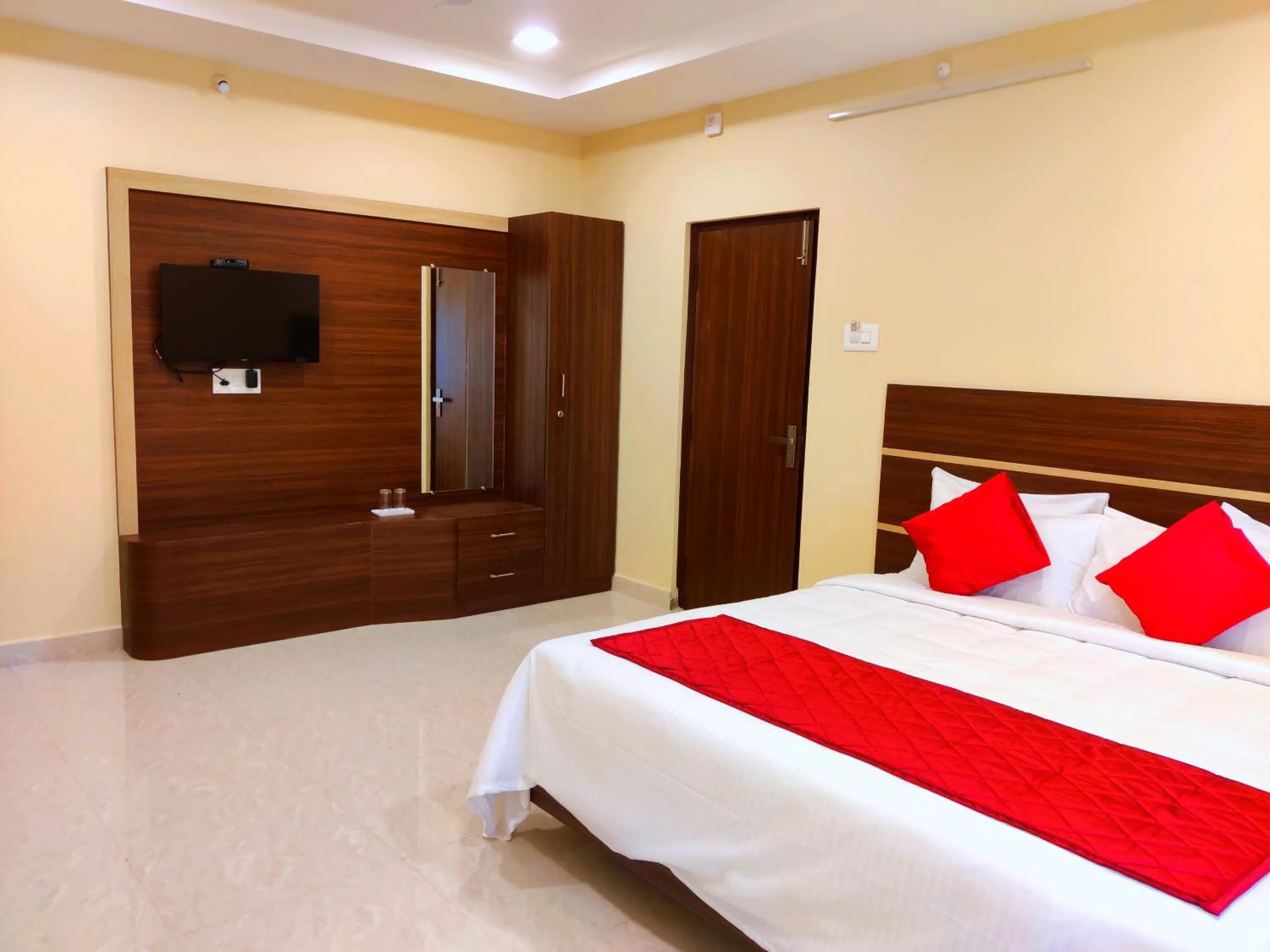 Photo of the whole room, Bed in THAAI RESIDENCY