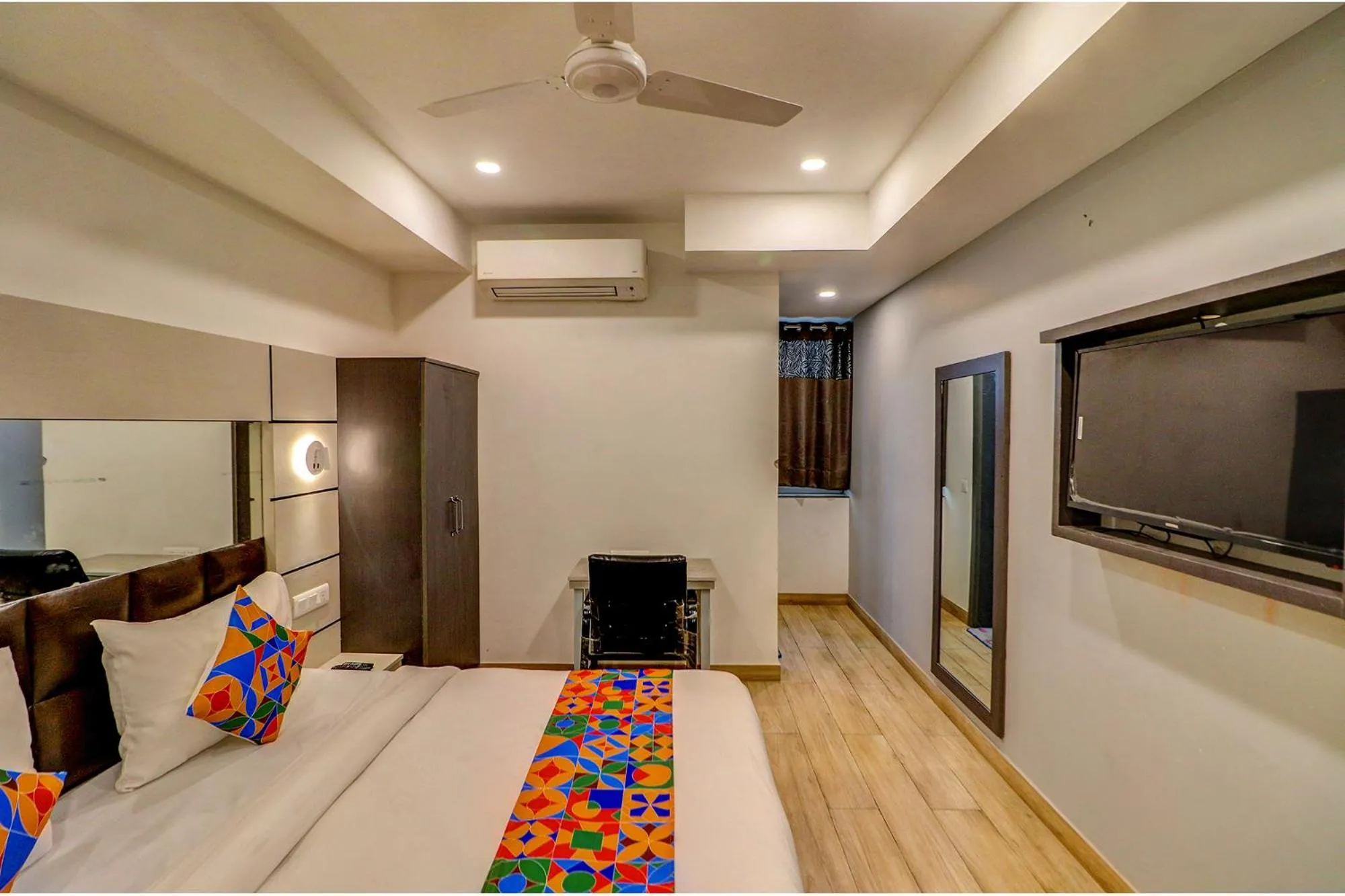 Bed in FabHotel Kirti Nagar