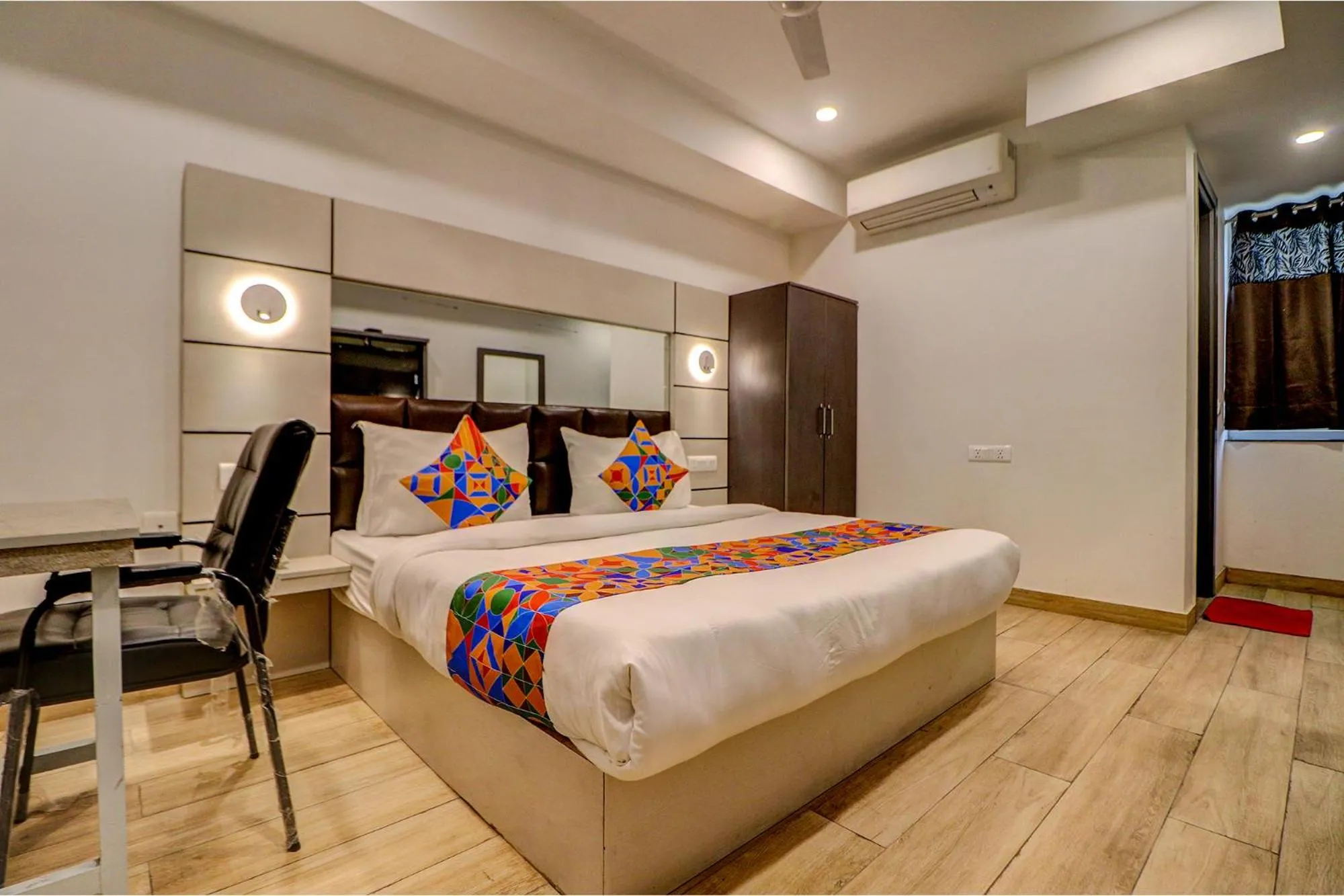 Bed in FabHotel Kirti Nagar