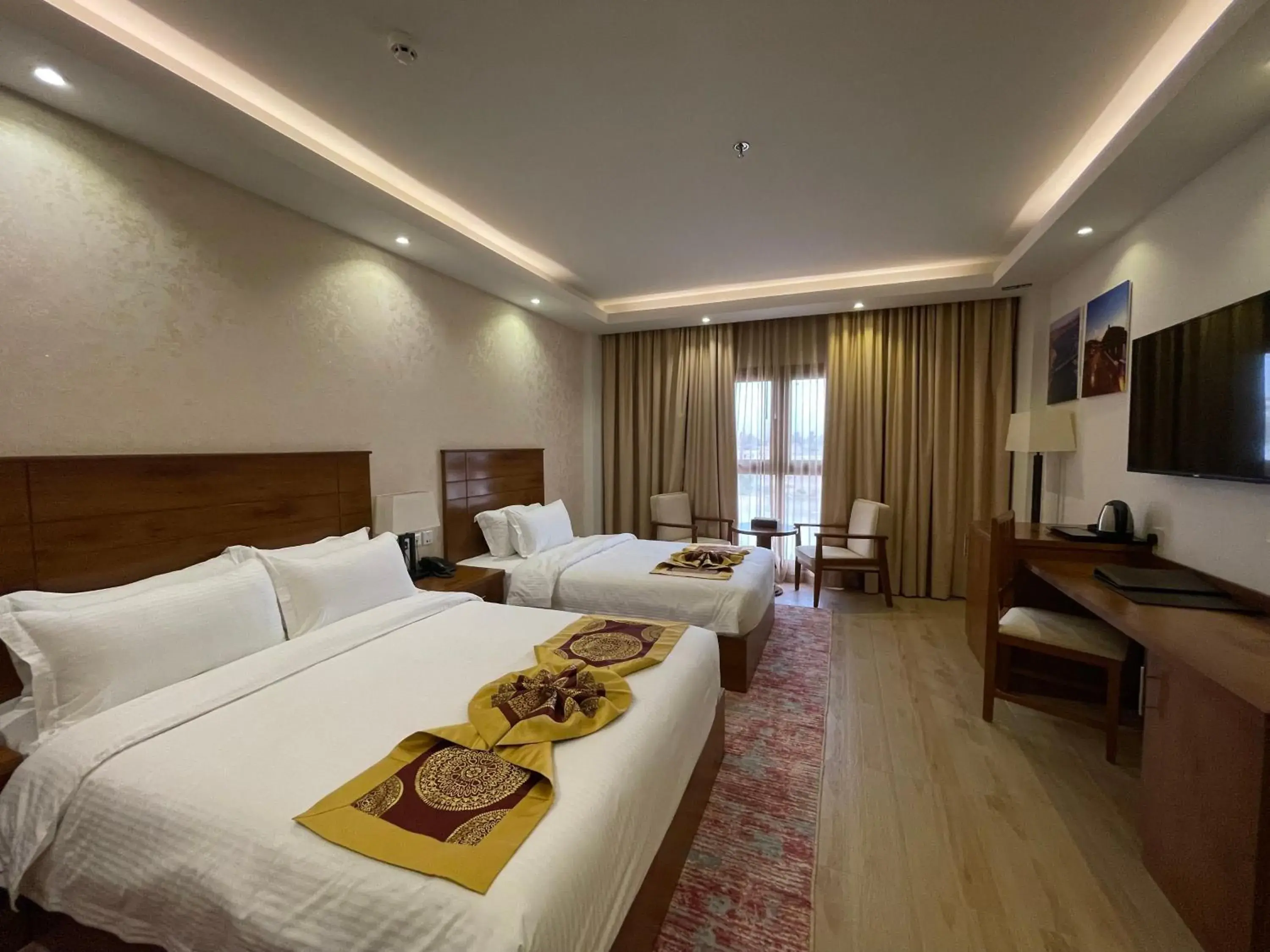Triple Room in Alsahwa Hotel Triple Room in Alsahwa Hotel