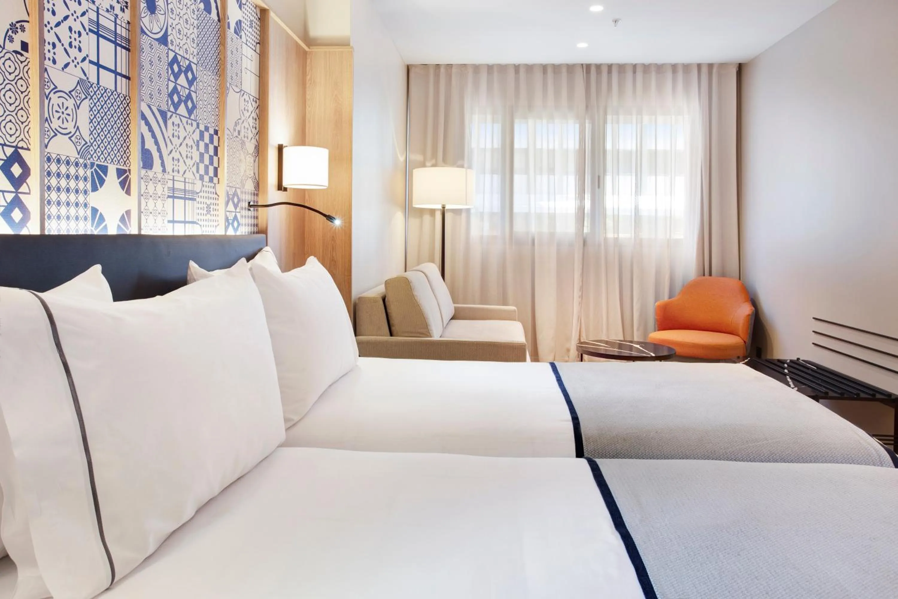 Photo of the whole room, Bed in Eurostars Guadalquivir