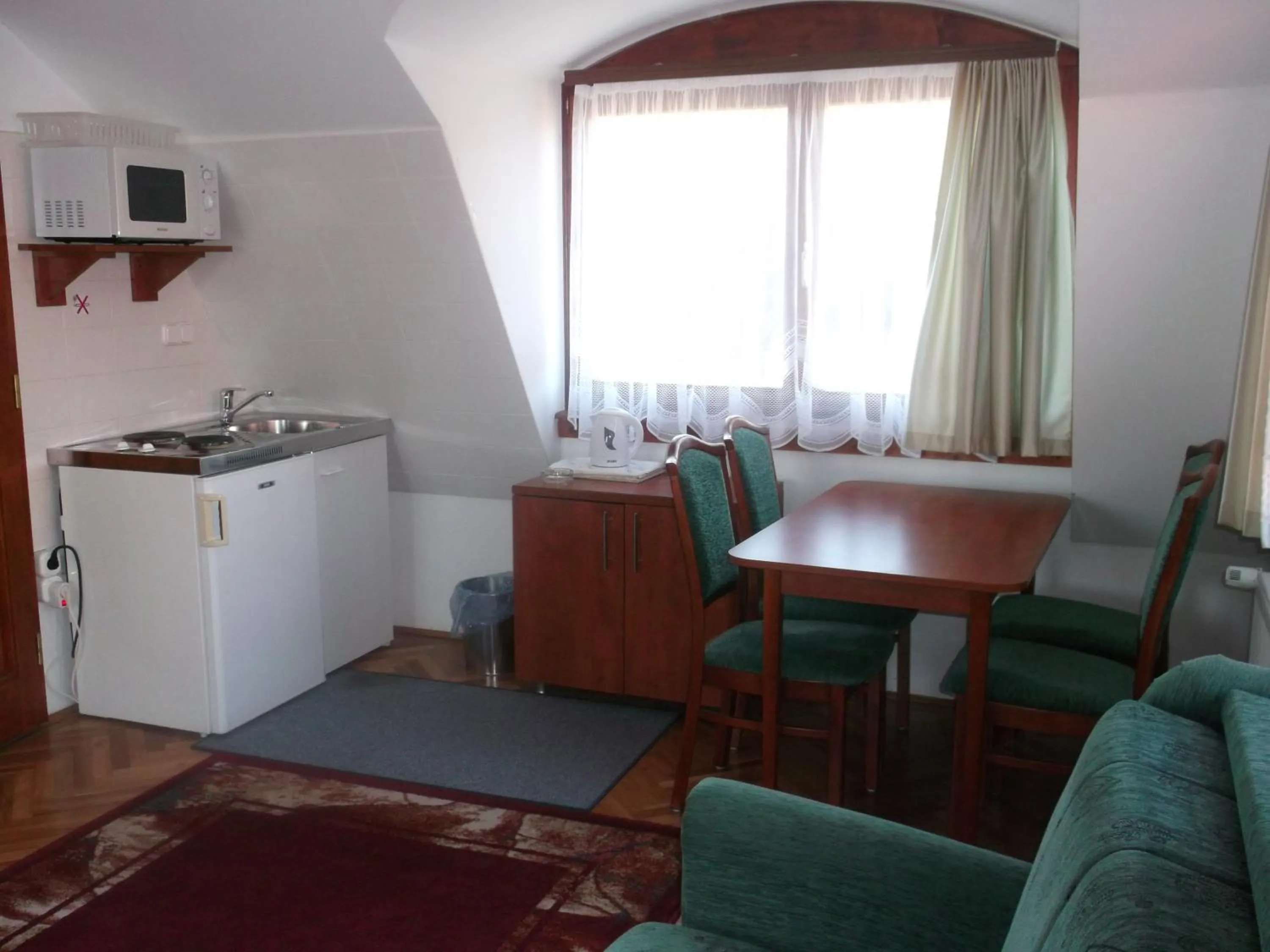 Kitchen or kitchenette in HELIOS Hotel Apartments