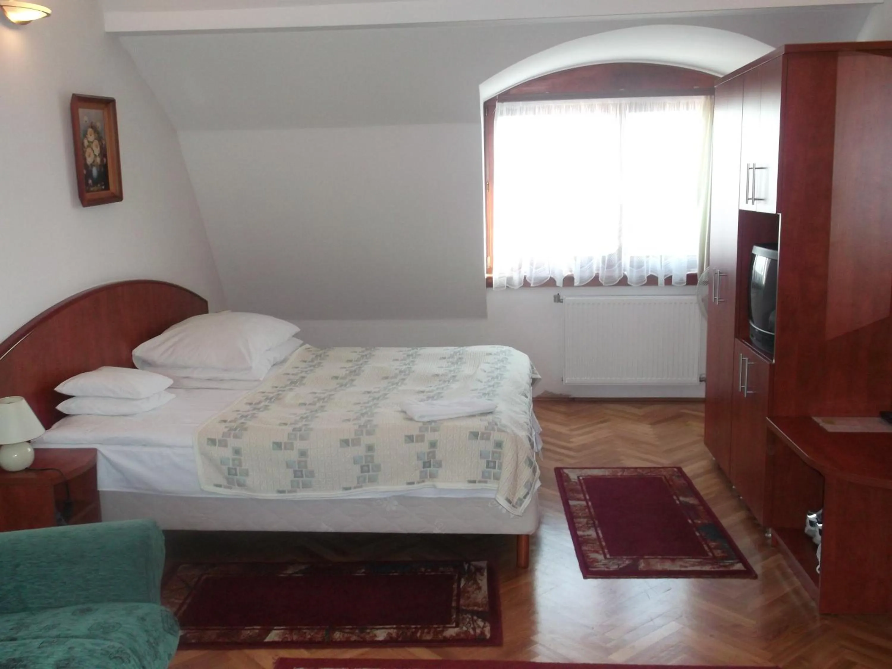 Bed in HELIOS Hotel Apartments