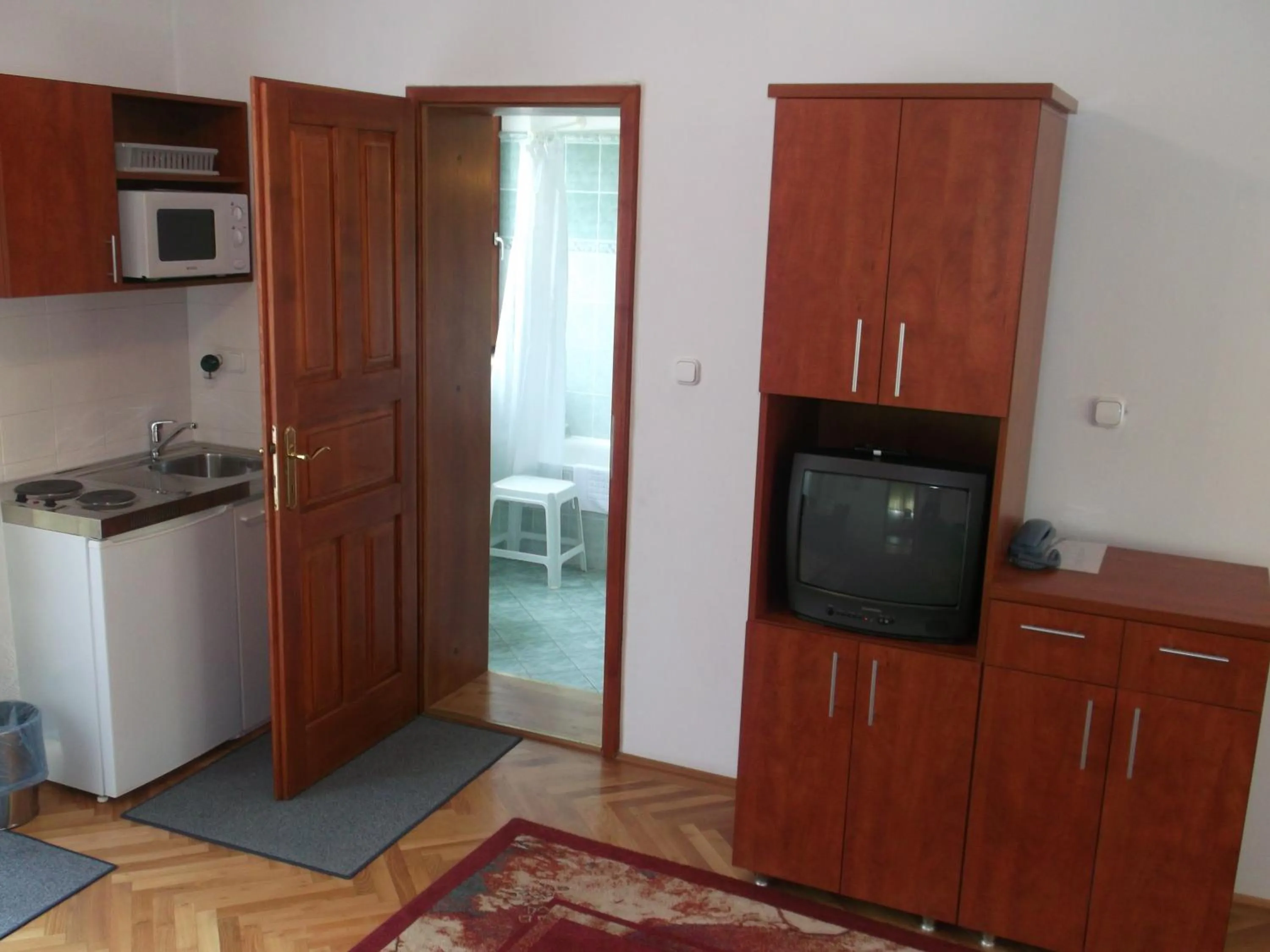 Kitchen or kitchenette in HELIOS Hotel Apartments