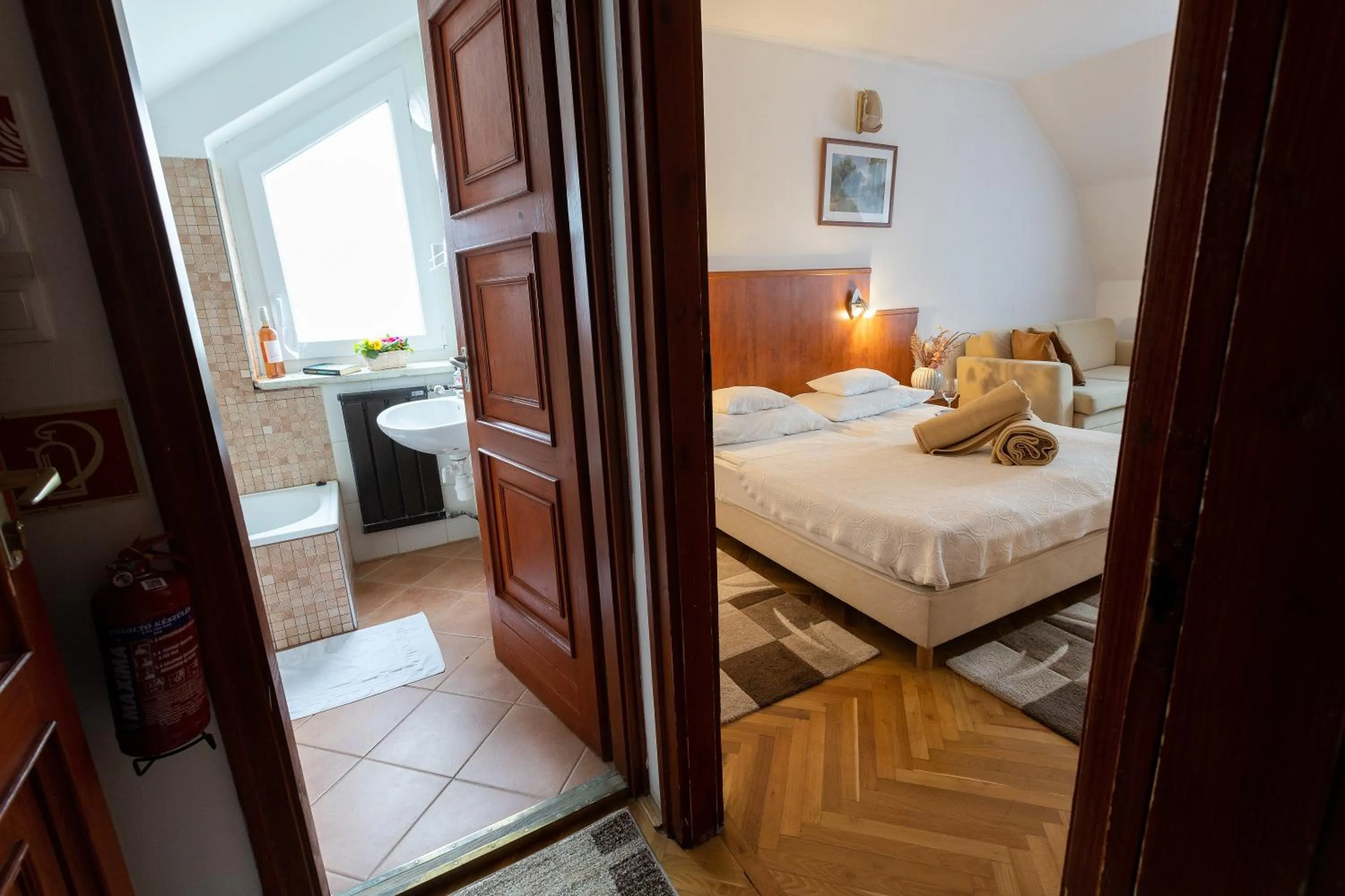 Bed in HELIOS Hotel Apartments