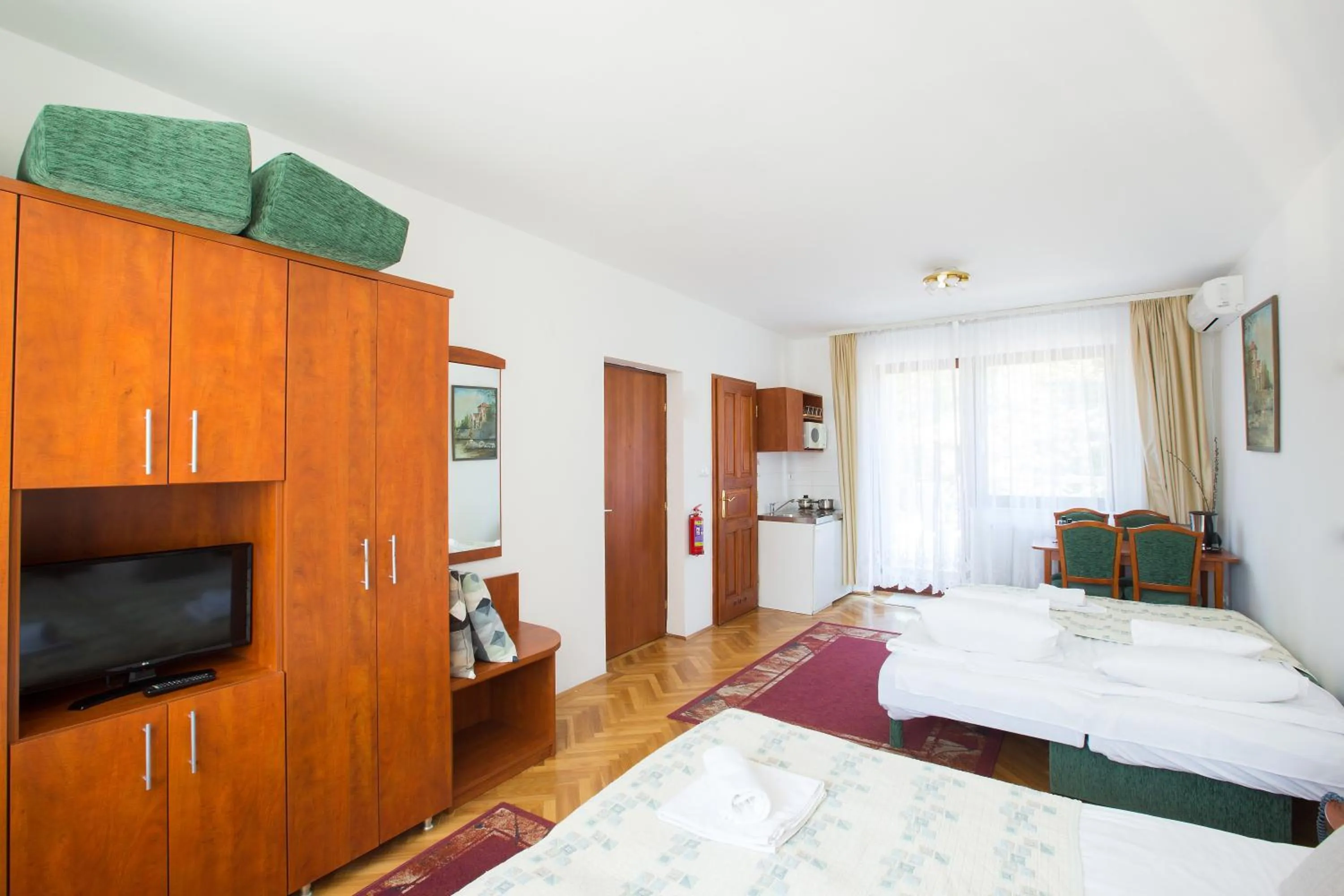 Bed in HELIOS Hotel Apartments