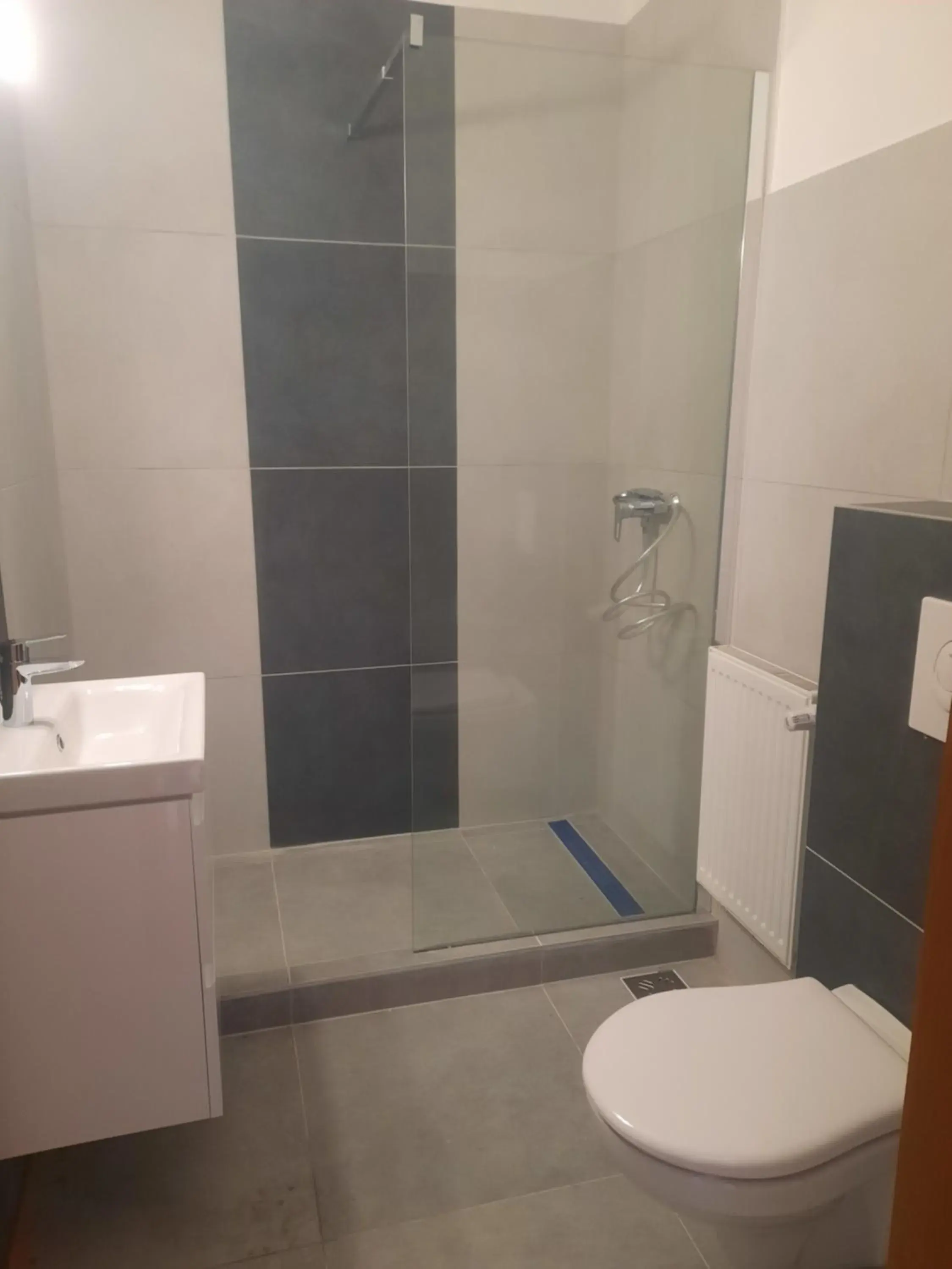 Property building, Bathroom in HELIOS Hotel Apartments