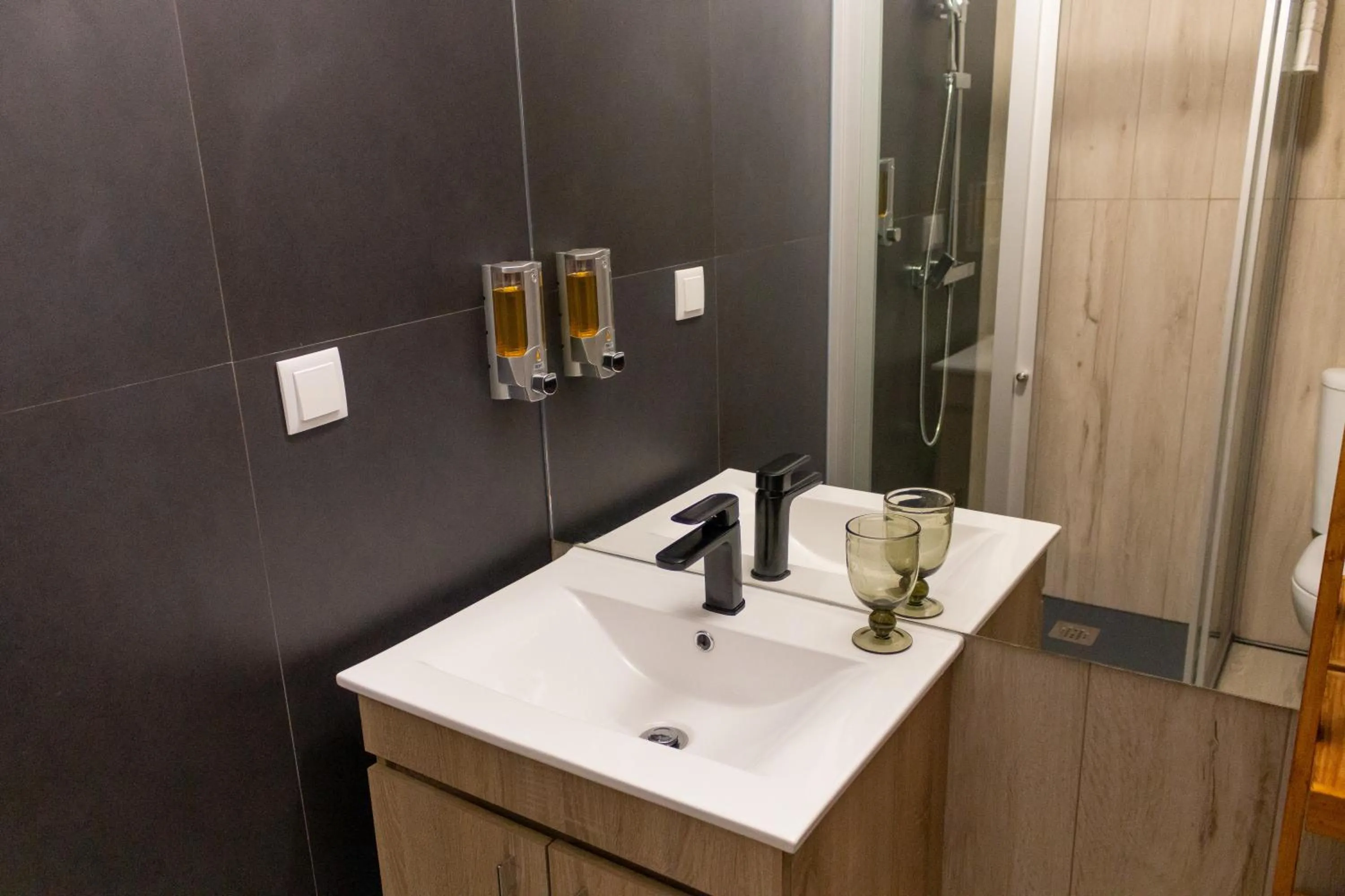 Bathroom in Golden Mirror