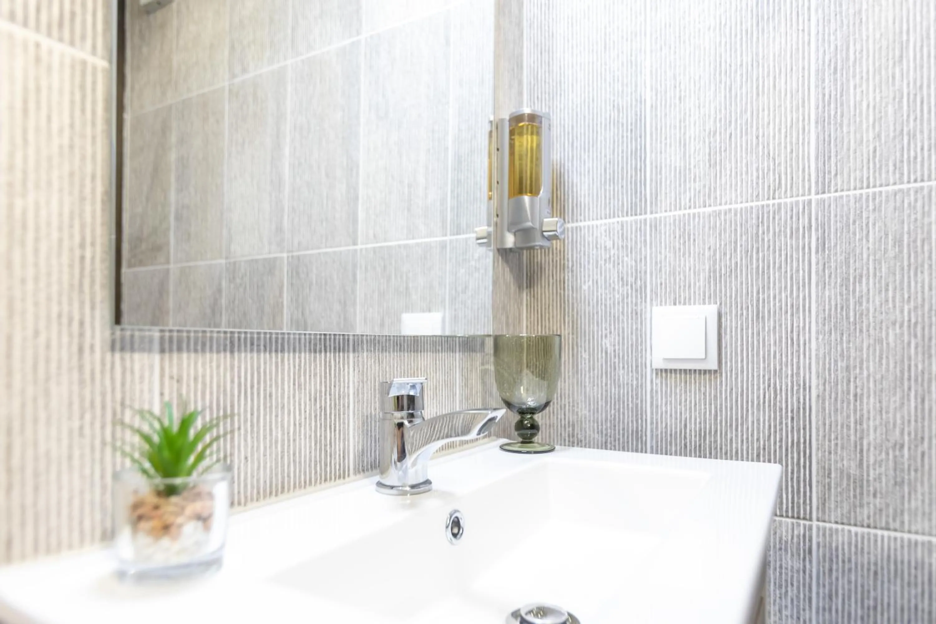 Bathroom in Golden Mirror