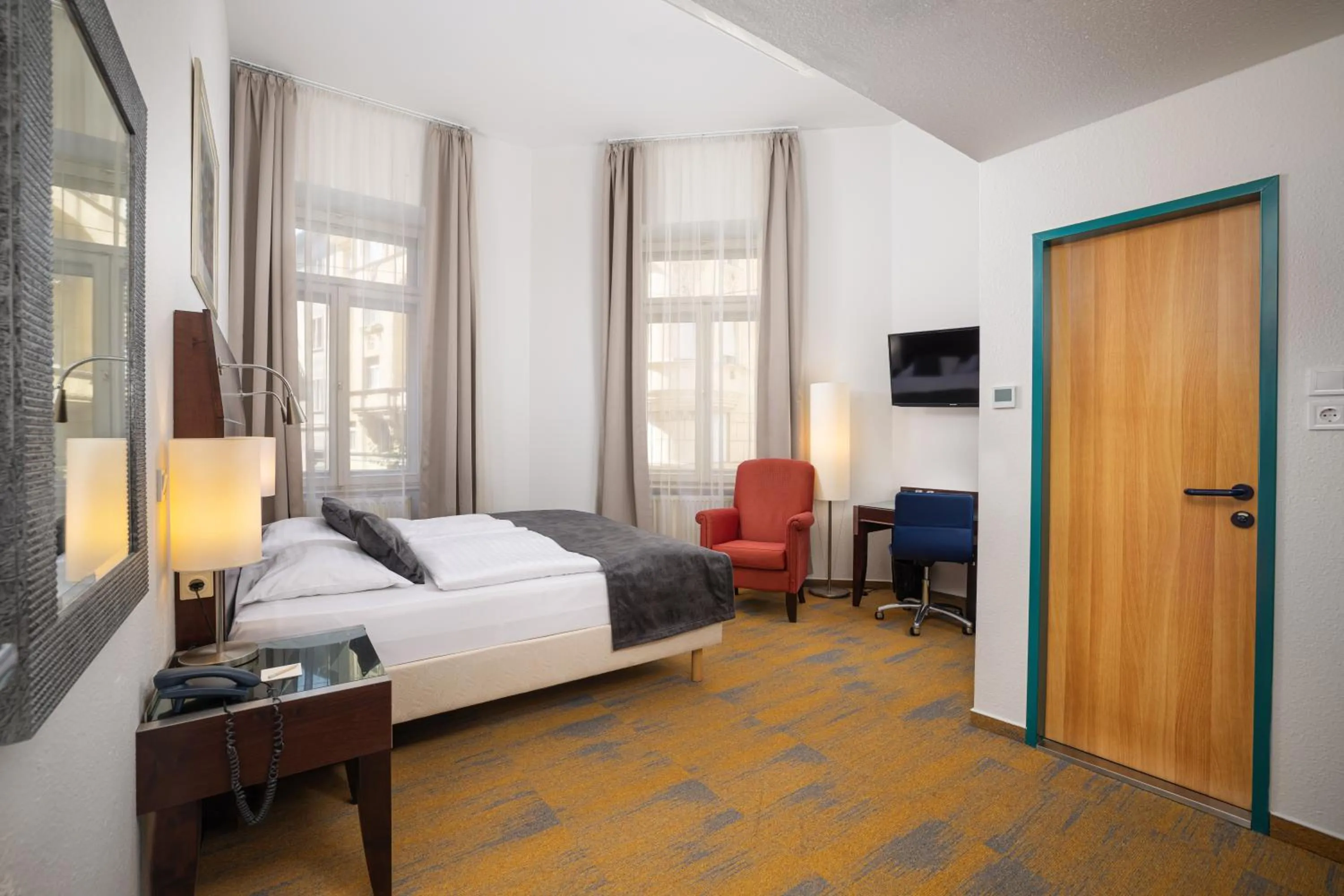 Bed in City Hotel Matyas