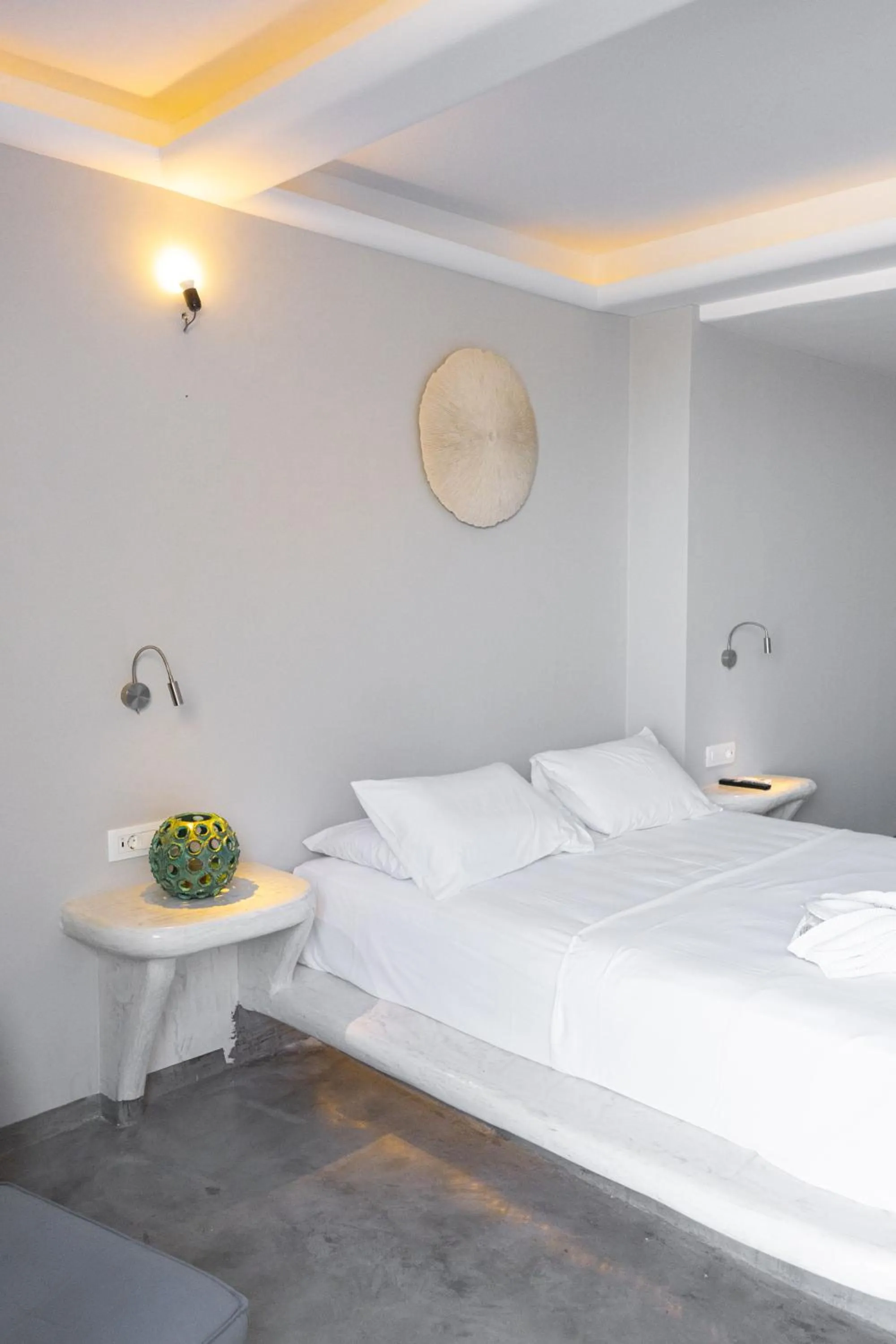 Bed in Demilmar Luxury Suites